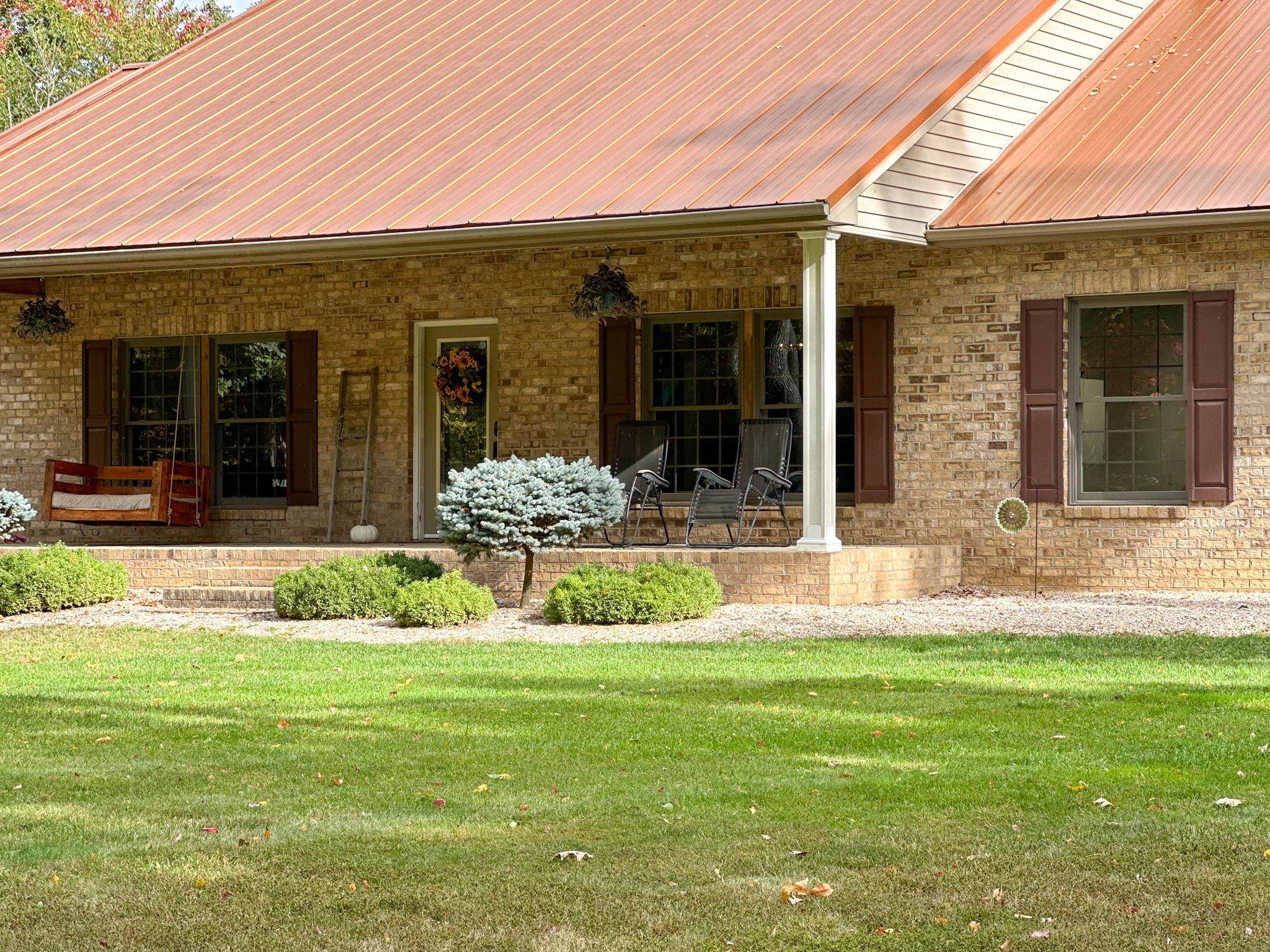 1426 Roman Road Mount Sidney, VA 24467 - Photo 9 of 46 a front view of a house with a yard