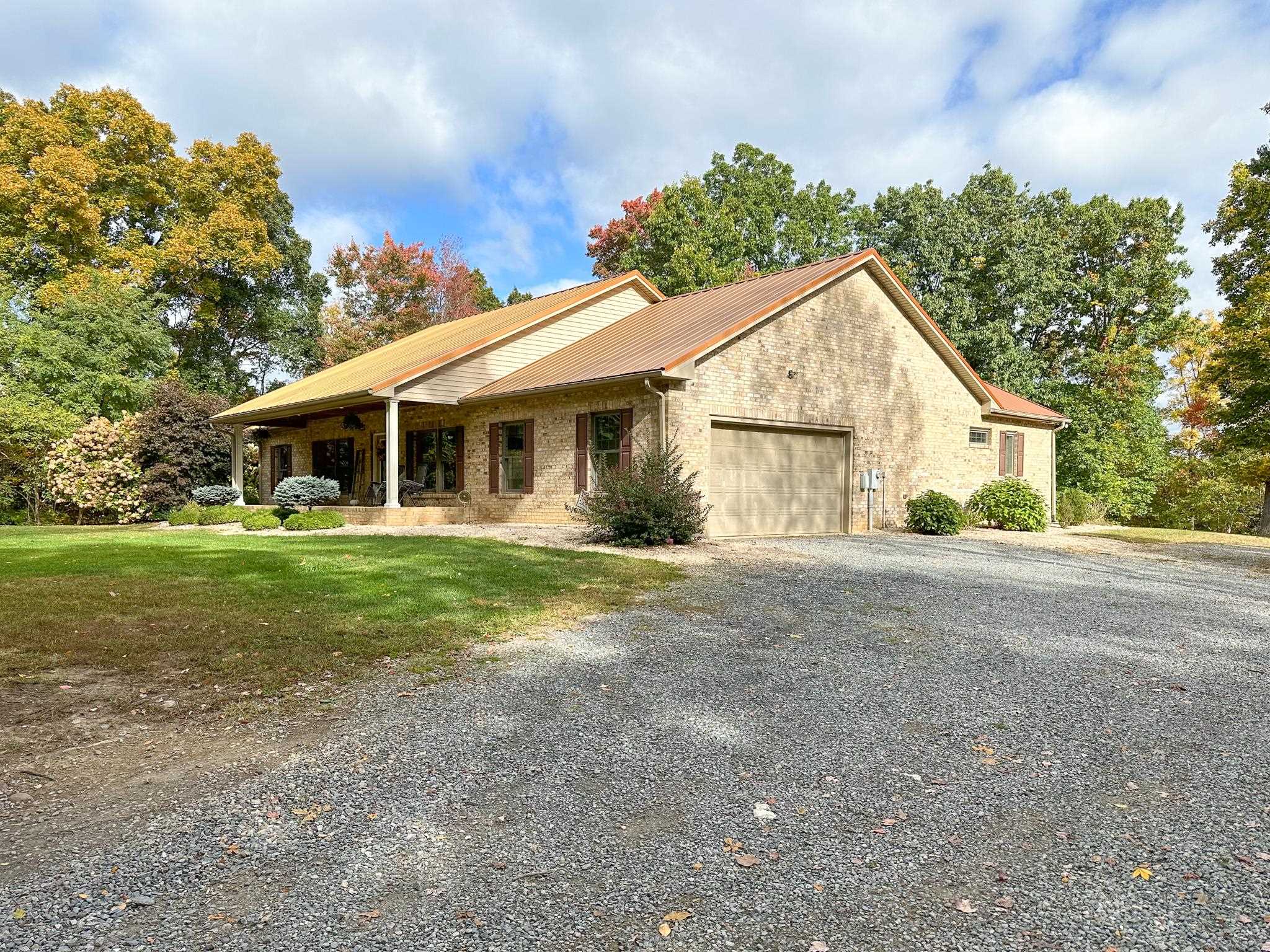 1426 Roman Road Mount Sidney, VA 24467 - Photo 10 of 46 a view of a house with yard and a garden