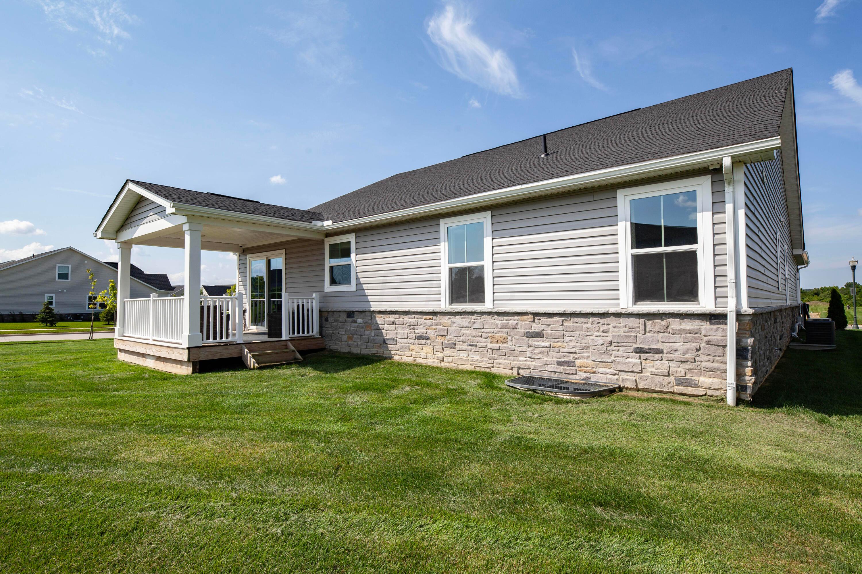 97 Firenze Road Delaware, OH 43015 - Photo 28 of 30 the stone exterior wraps around the entire home