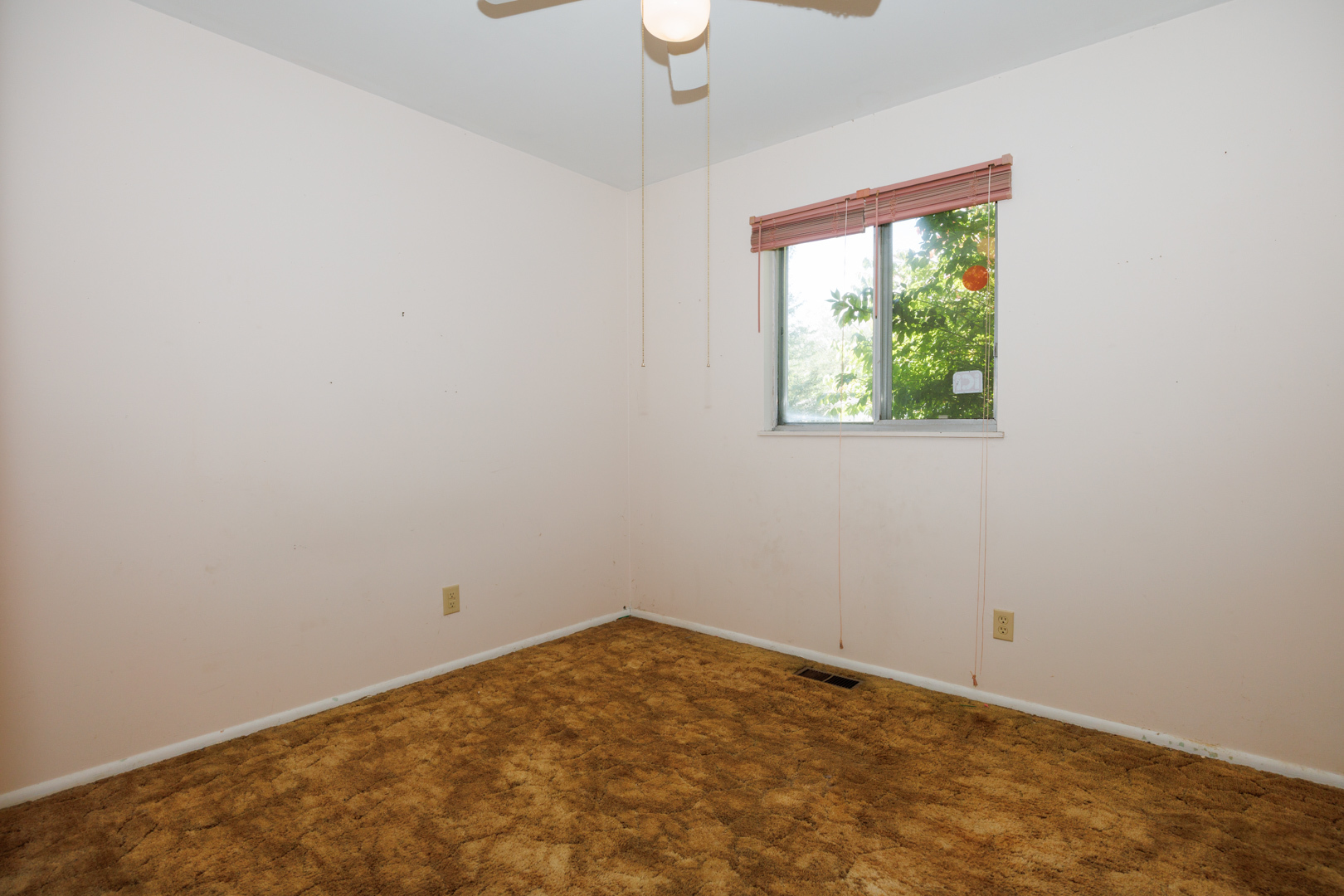 1307 Glenwood Road Bloomington, IL 61704 - Photo 9 of 21 a view of empty room with window