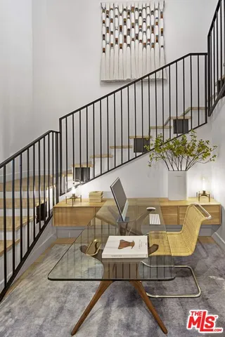 a view of balcony with furniture