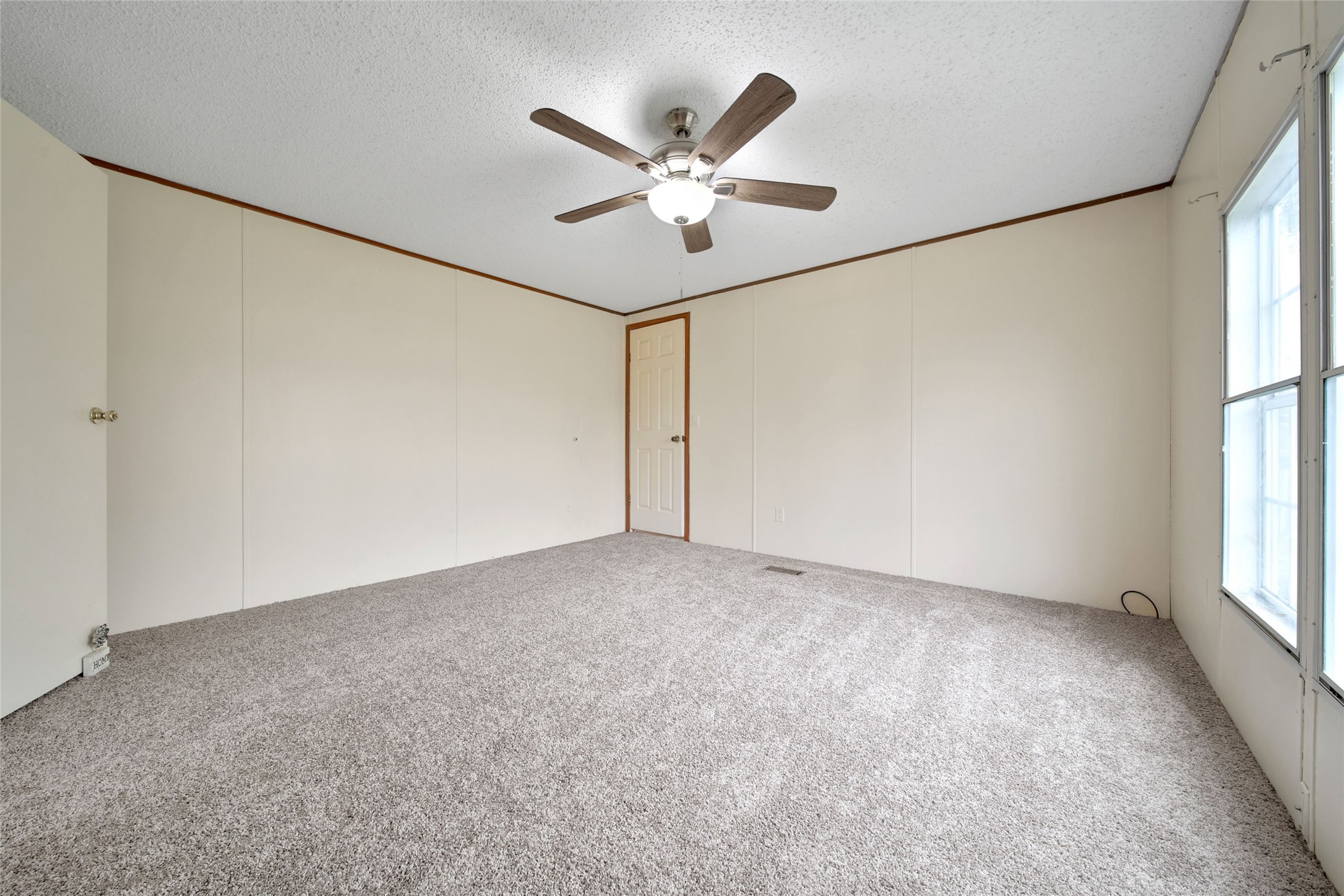 2 Jacob Street Huntsville, TX 77320 - Photo 13 of 20 a view of an empty room with a window