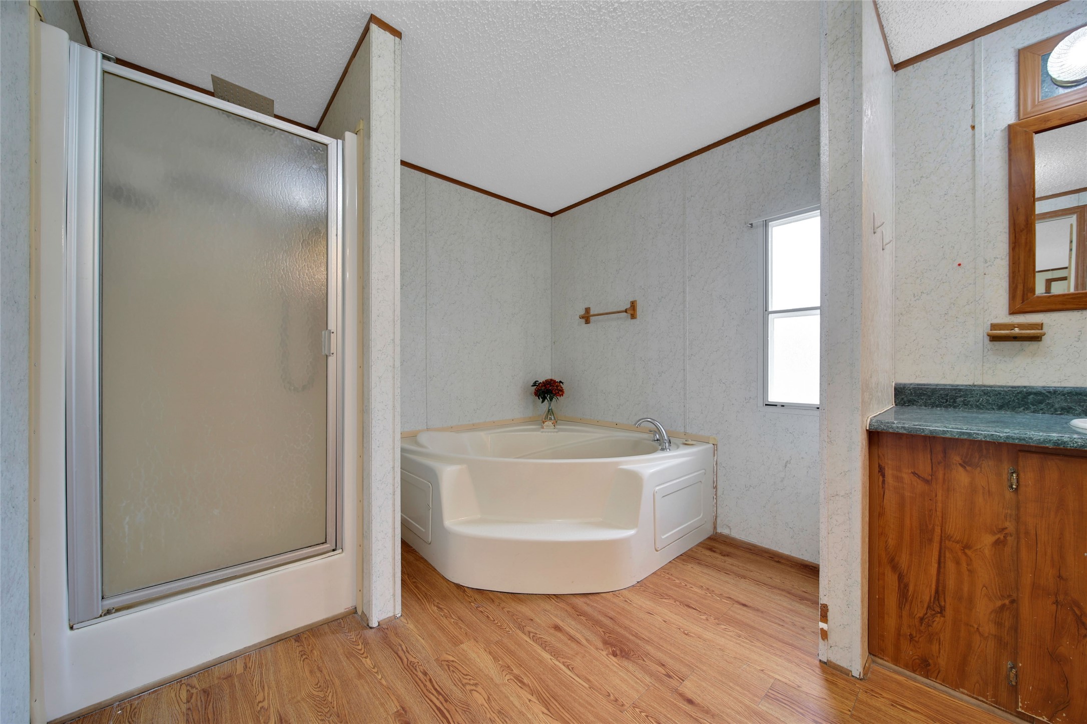 2 Jacob Street Huntsville, TX 77320 - Photo 15 of 20 a bathroom with a tub and shower