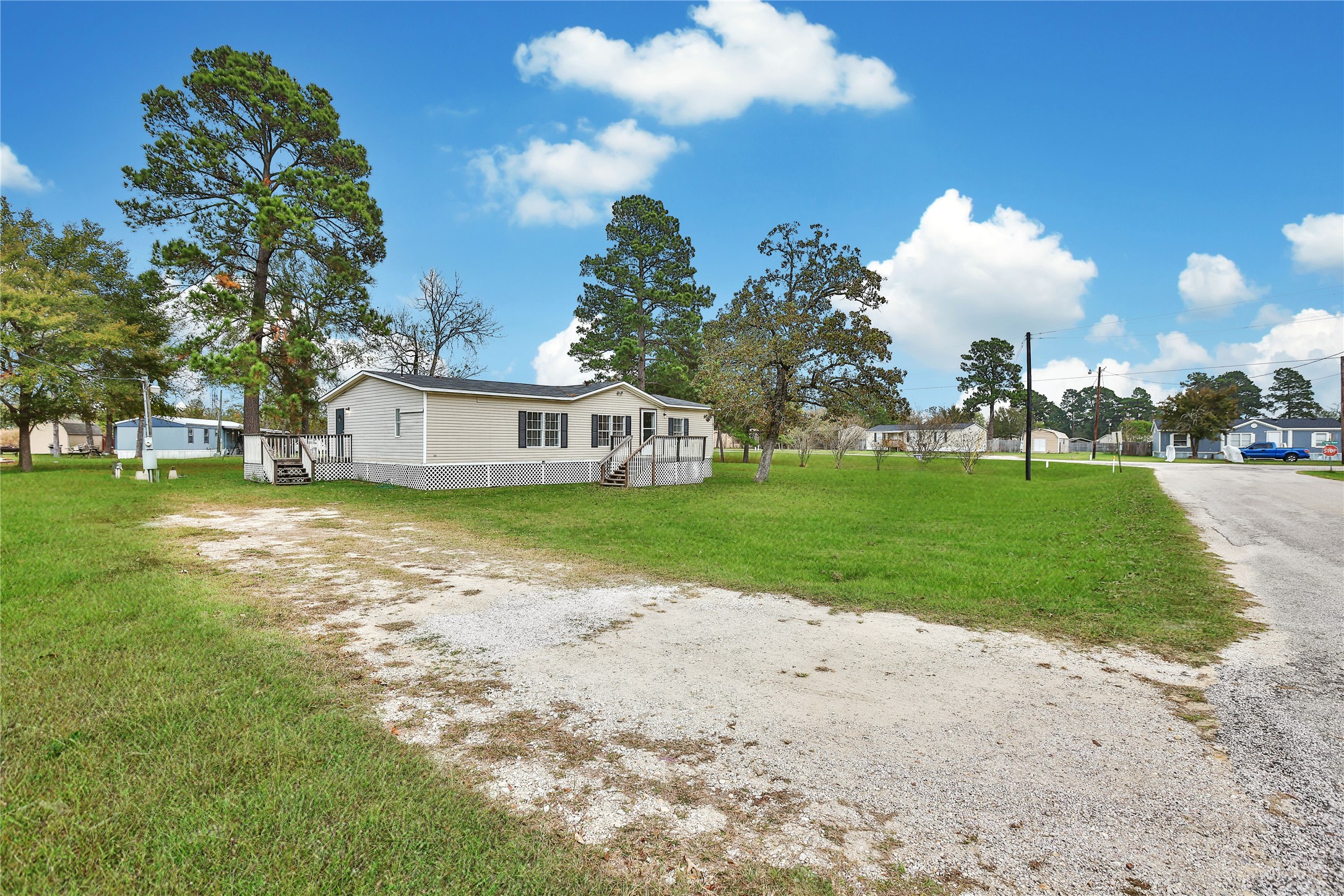 2 Jacob Street Huntsville, TX 77320 - Photo 2 of 20 a view of a house with a yard