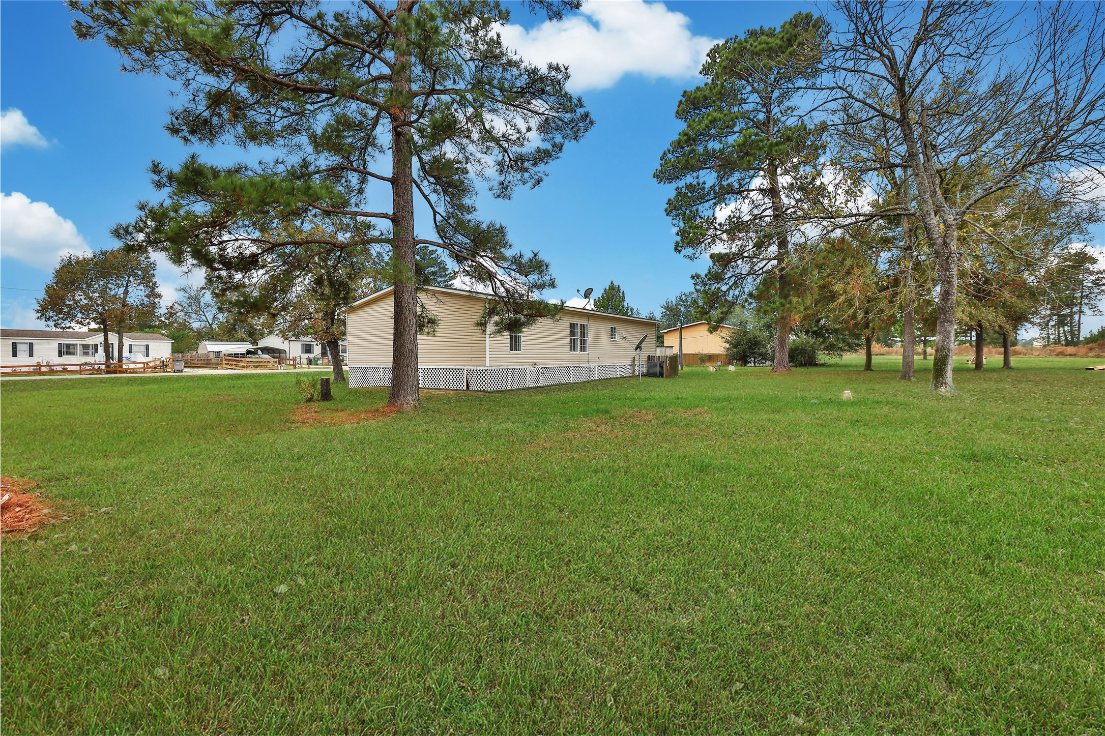 2 Jacob Street Huntsville, TX 77320 - Photo 4 of 20 a view of a park with large trees