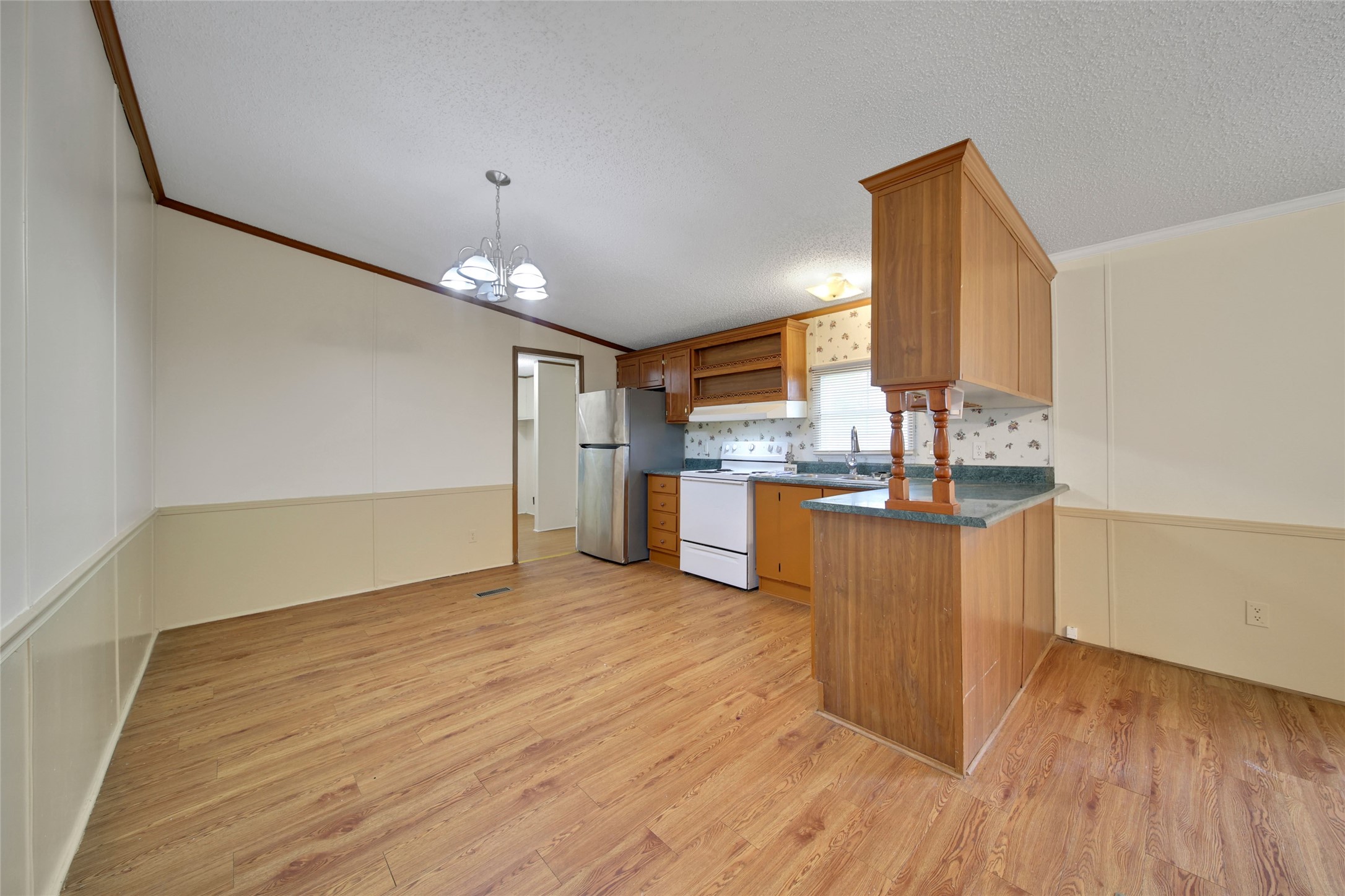 2 Jacob Street Huntsville, TX 77320 - Photo 9 of 20 a view of kitchen with wooden floor