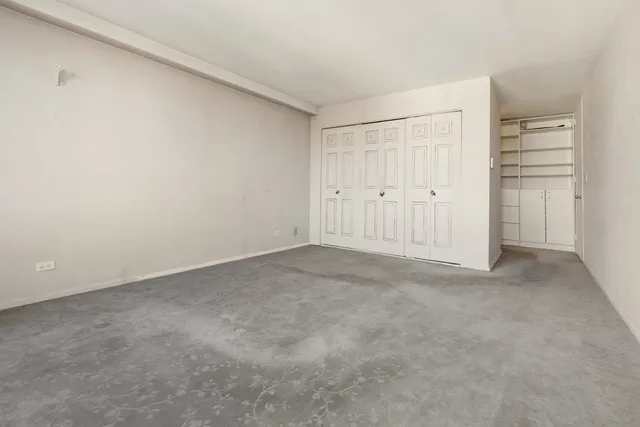 a view of an empty walk in closet