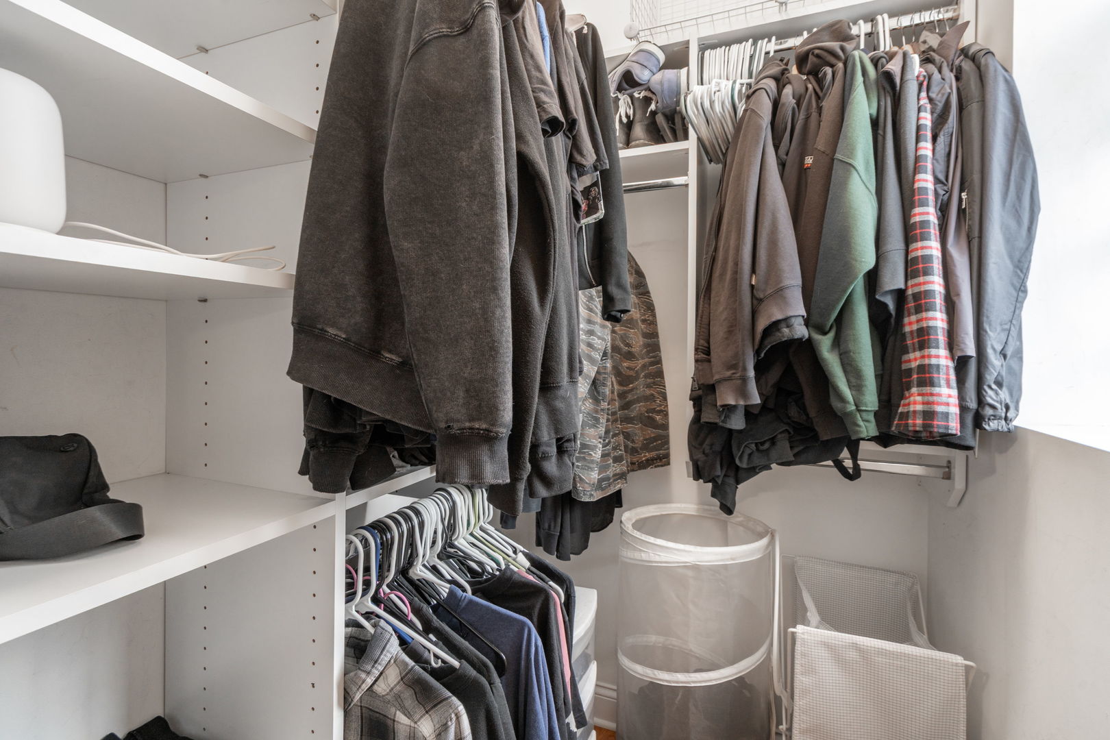 2624 West Rice Street, Unit 2F Chicago, IL 60622 - Photo 11 of 17 a view of walk in closet with clothes and shoes
