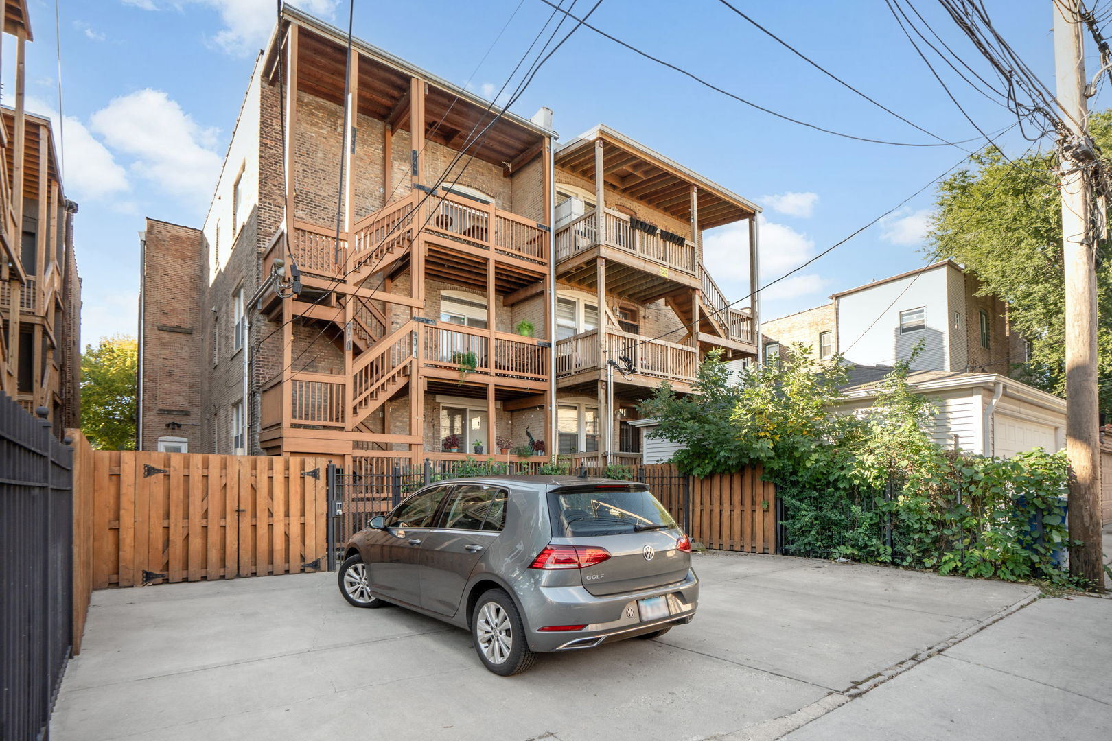2624 West Rice Street, Unit 2F Chicago, IL 60622 - Photo 17 of 17 a car parked in front of a building
