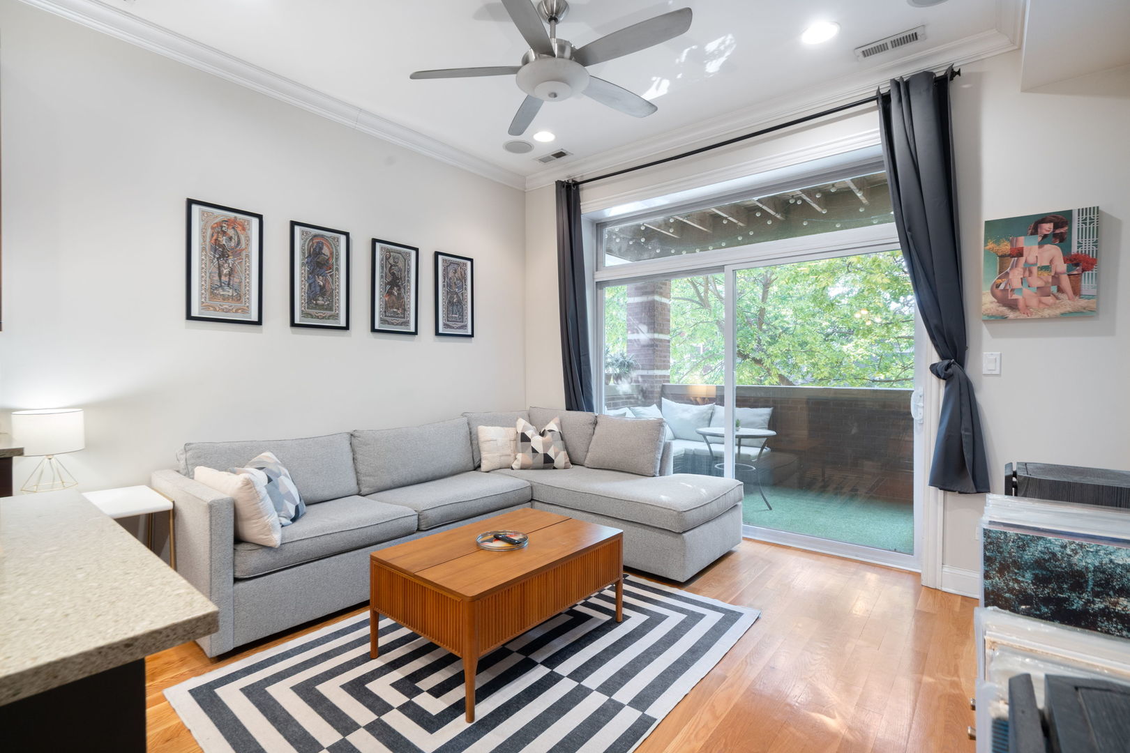 2624 West Rice Street, Unit 2F Chicago, IL 60622 - Photo 2 of 17 a living room with furniture and a window
