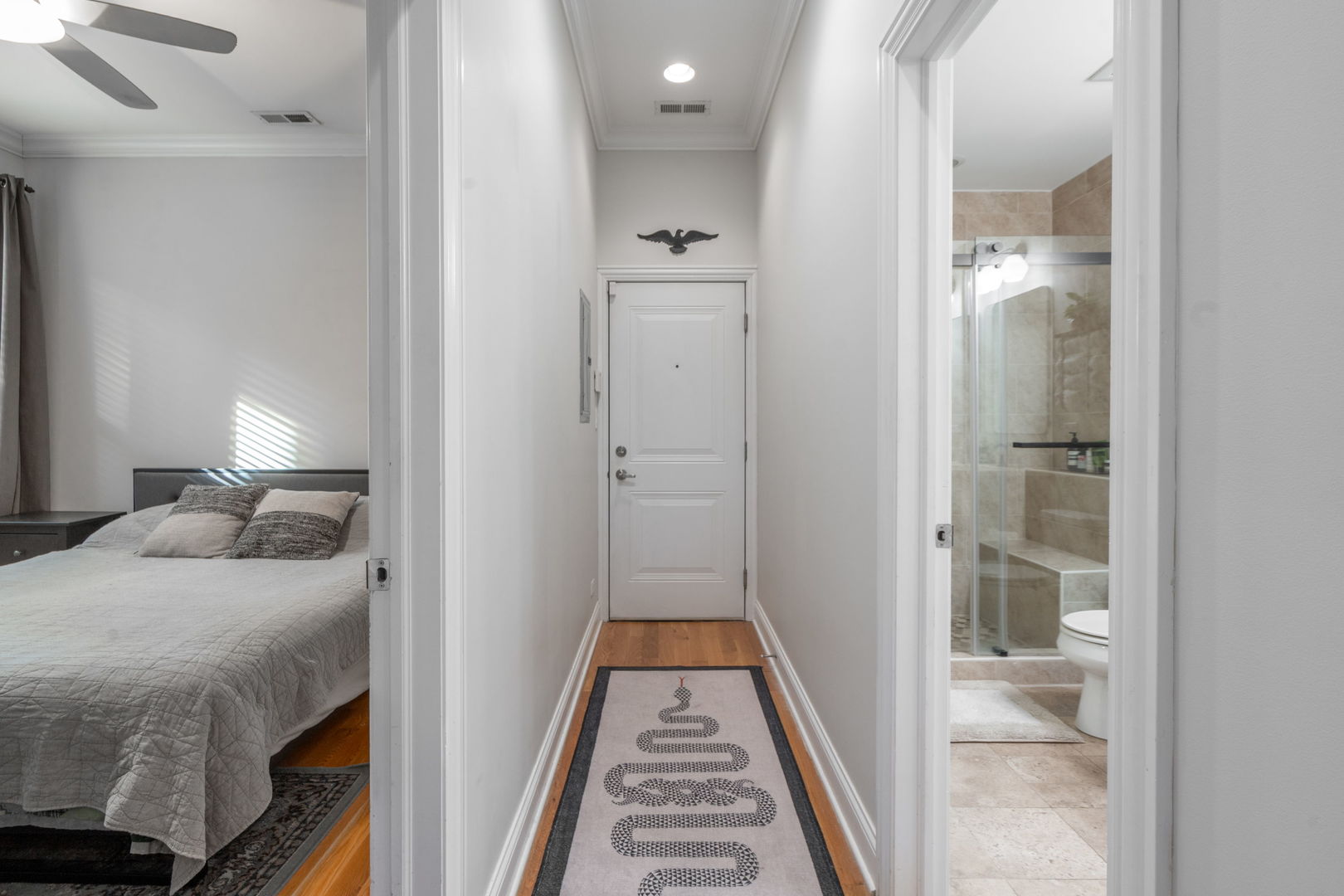 2624 West Rice Street, Unit 2F Chicago, IL 60622 - Photo 9 of 17 a en suite bathroom with a sink and a mirror