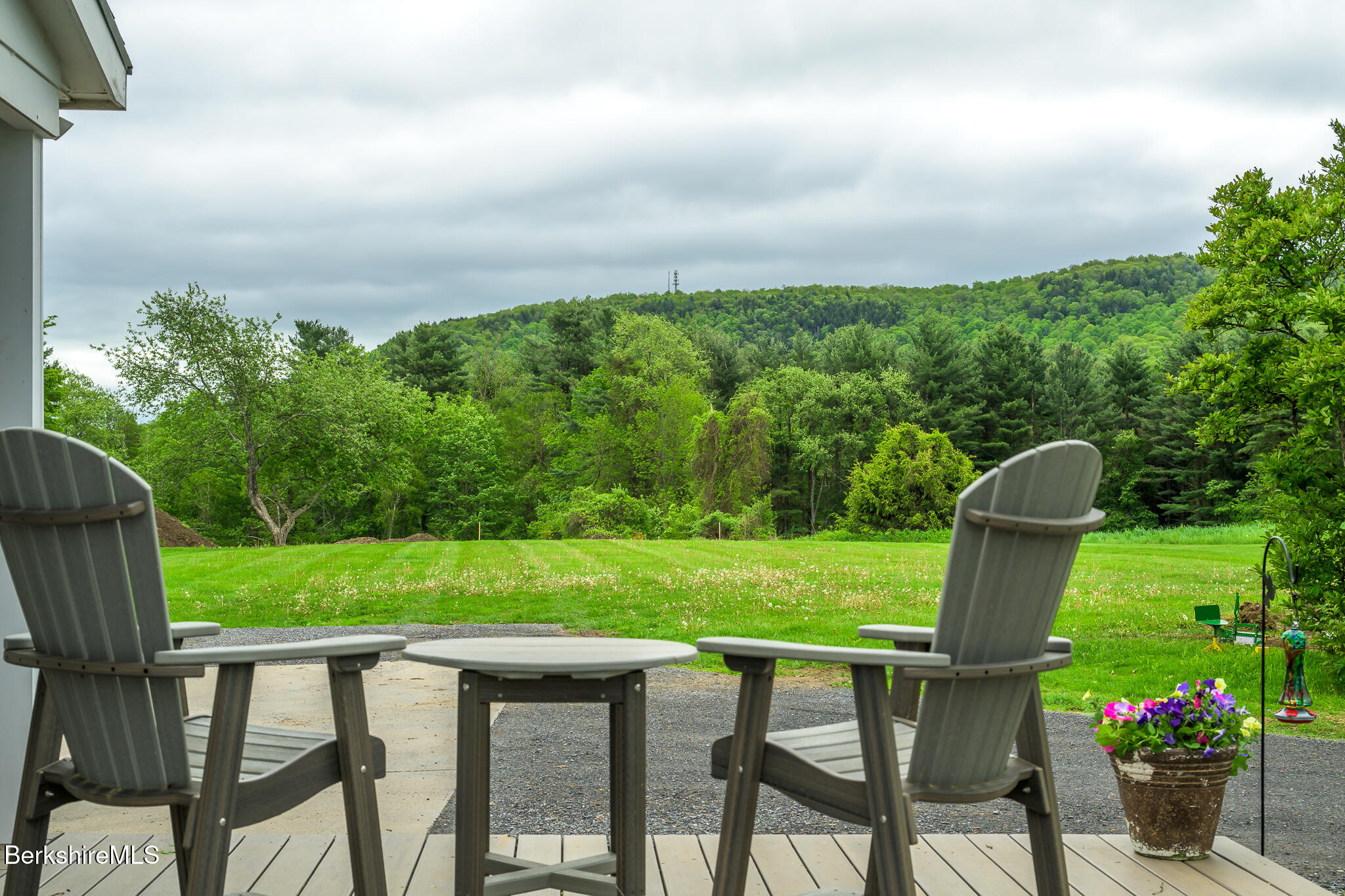 955 Barker Road Pittsfield, MA 01201 - Photo 1 of 35 a view of a chairs and table in the garden