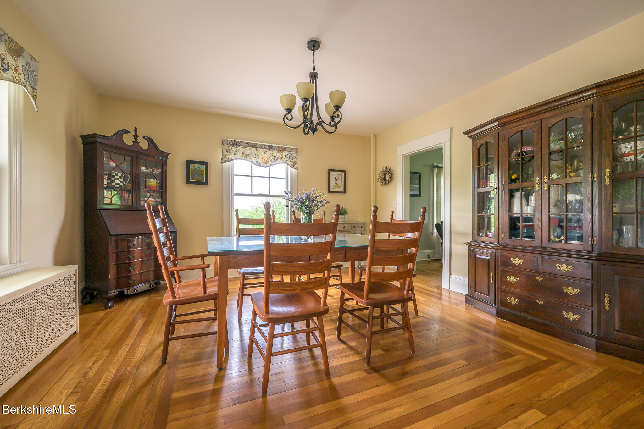 955 Barker Road Pittsfield, MA 01201 - Photo 13 of 35 a view of a dining room with furniture window and wooden floor