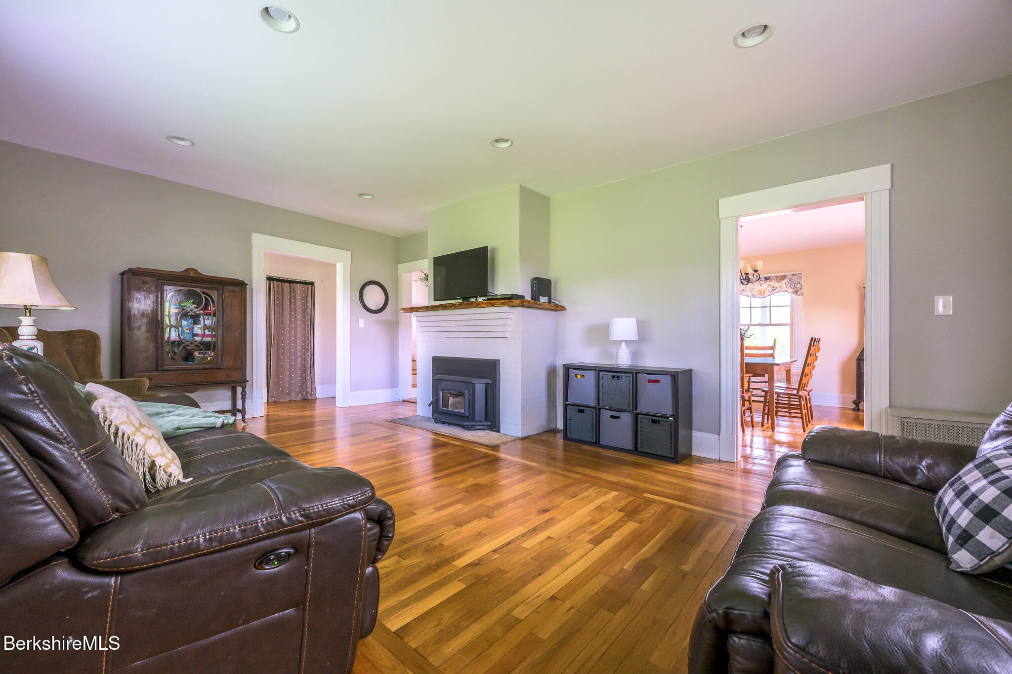 955 Barker Road Pittsfield, MA 01201 - Photo 14 of 35 a living room with furniture and a fireplace