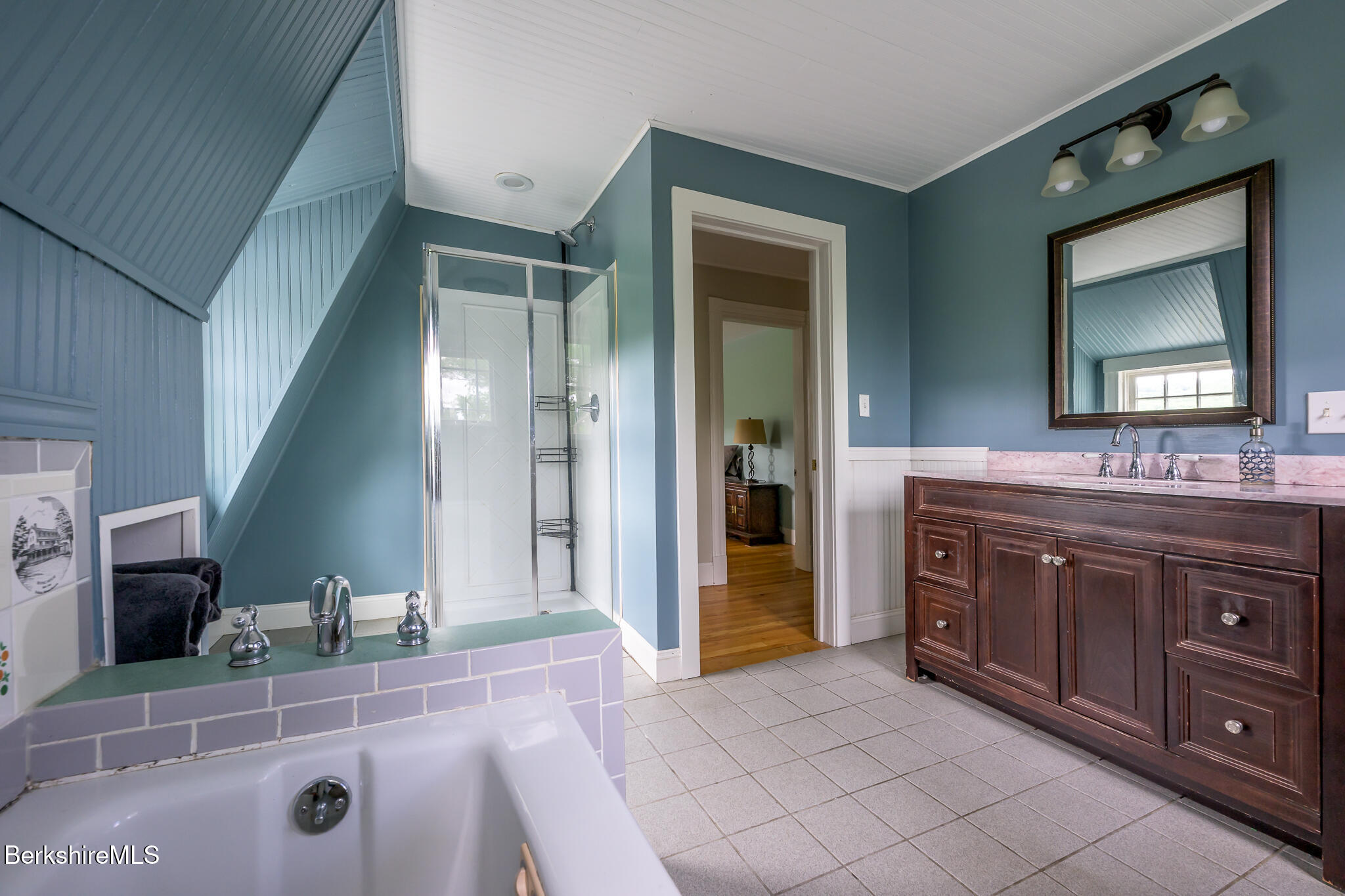 955 Barker Road Pittsfield, MA 01201 - Photo 18 of 35 a spacious bathroom with a granite countertop double vanity sink mirror and shower