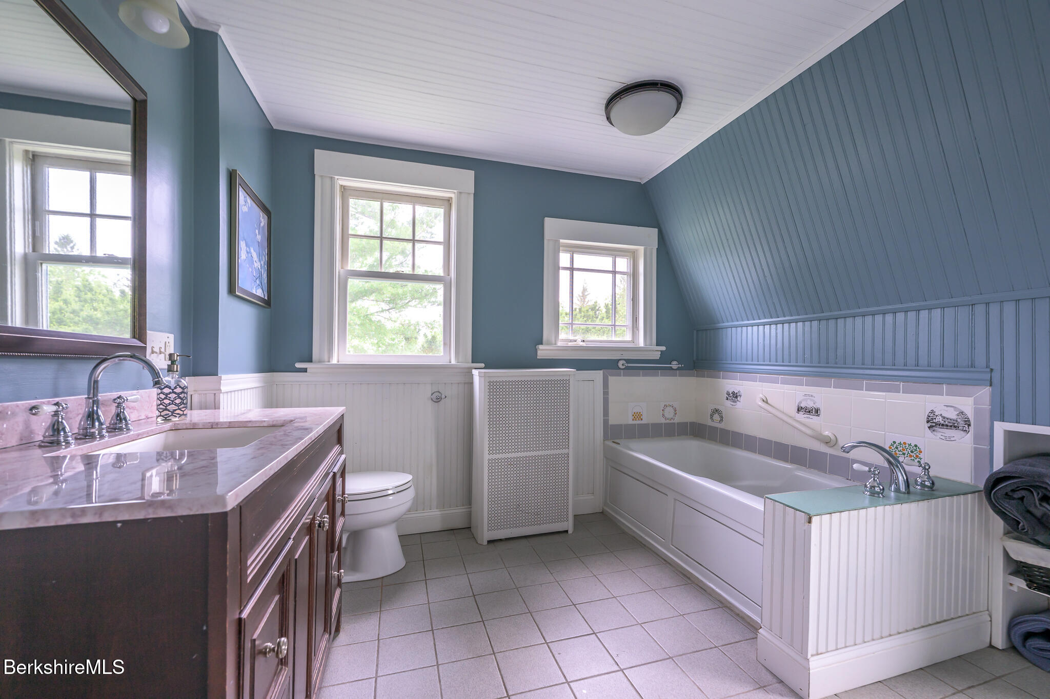 955 Barker Road Pittsfield, MA 01201 - Photo 19 of 35 a spacious bathroom with a granite countertop tub sink and mirror