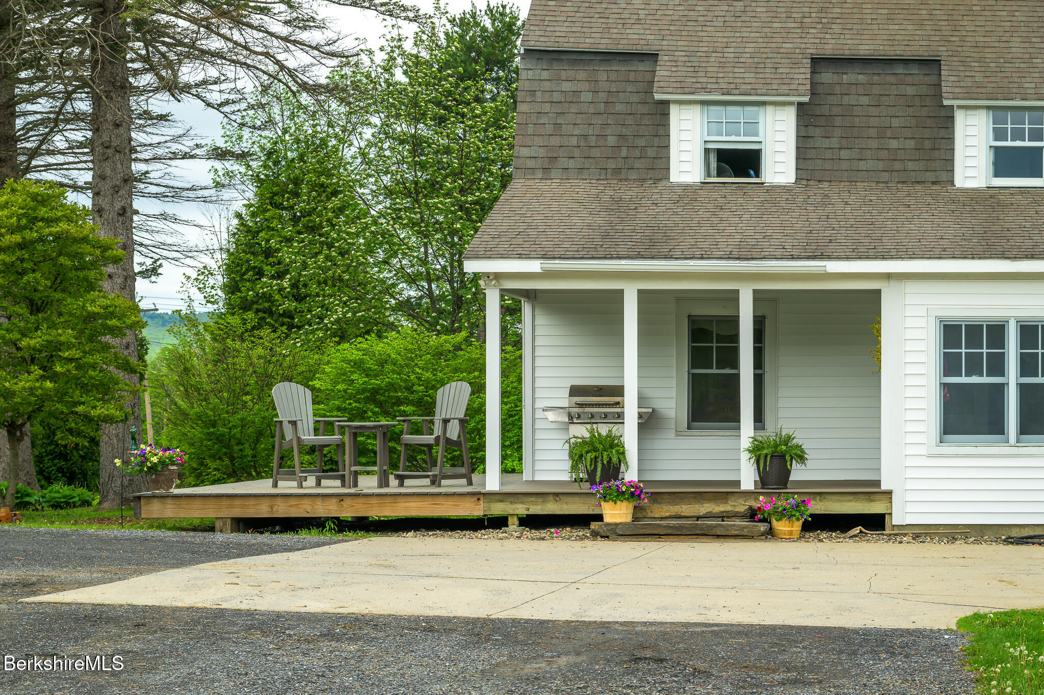 955 Barker Road Pittsfield, MA 01201 - Photo 5 of 35 a front view of a house with garden