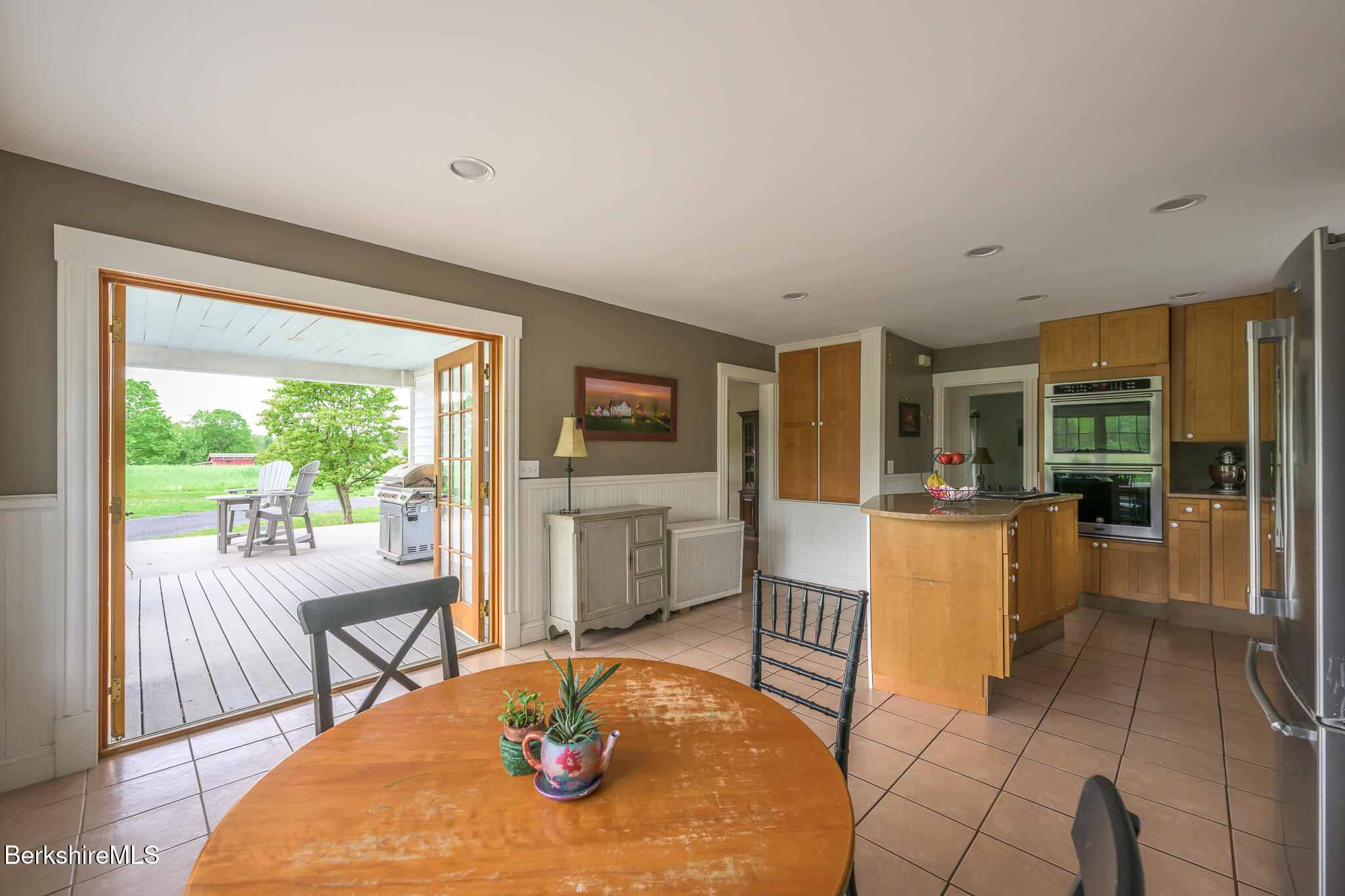 955 Barker Road Pittsfield, MA 01201 - Photo 6 of 35 a dining room with a table and chairs