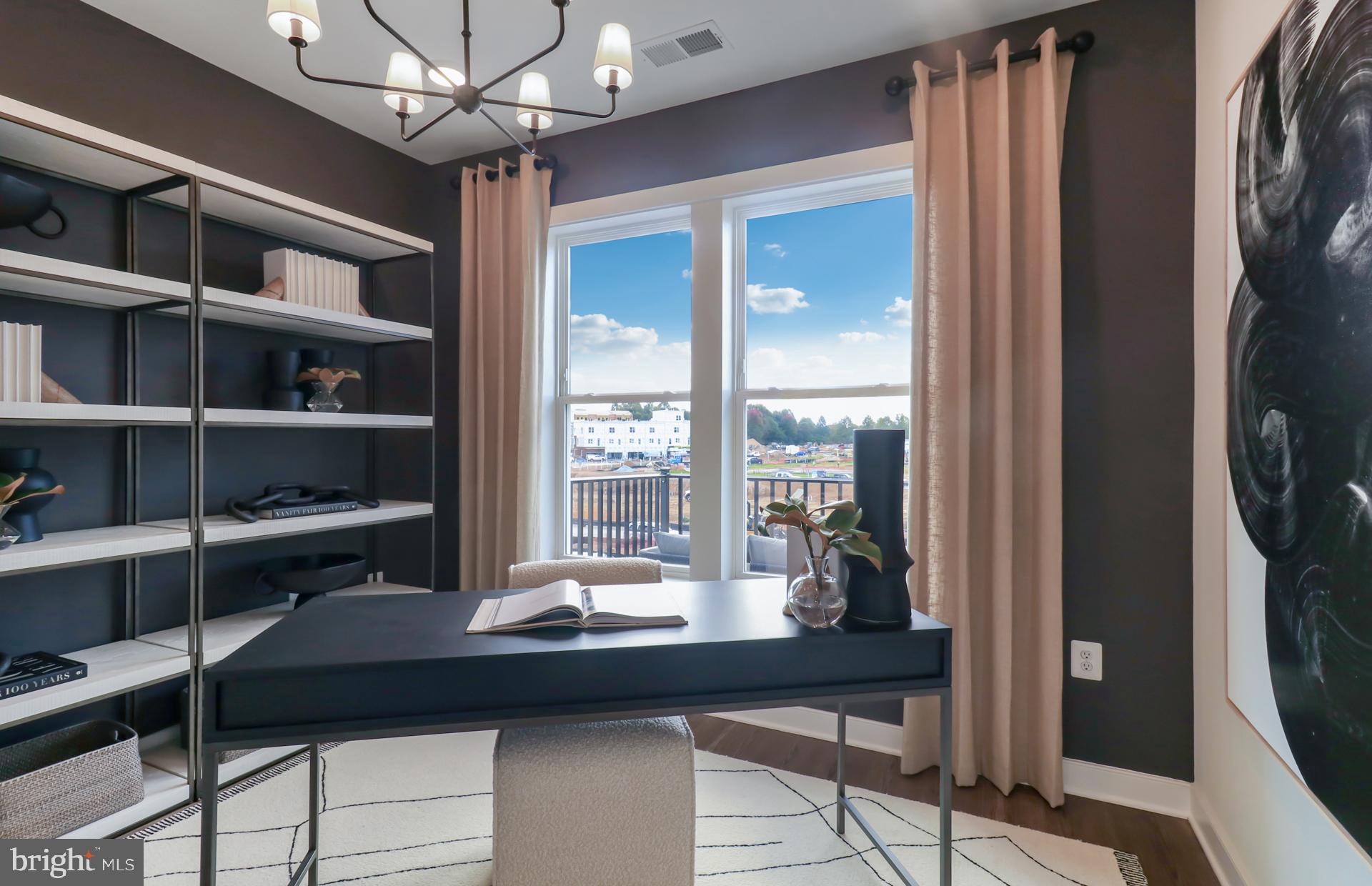 16146 Frederick Road Rockville, MD 20850 - Photo 10 of 41 a room with a table chairs and a large window