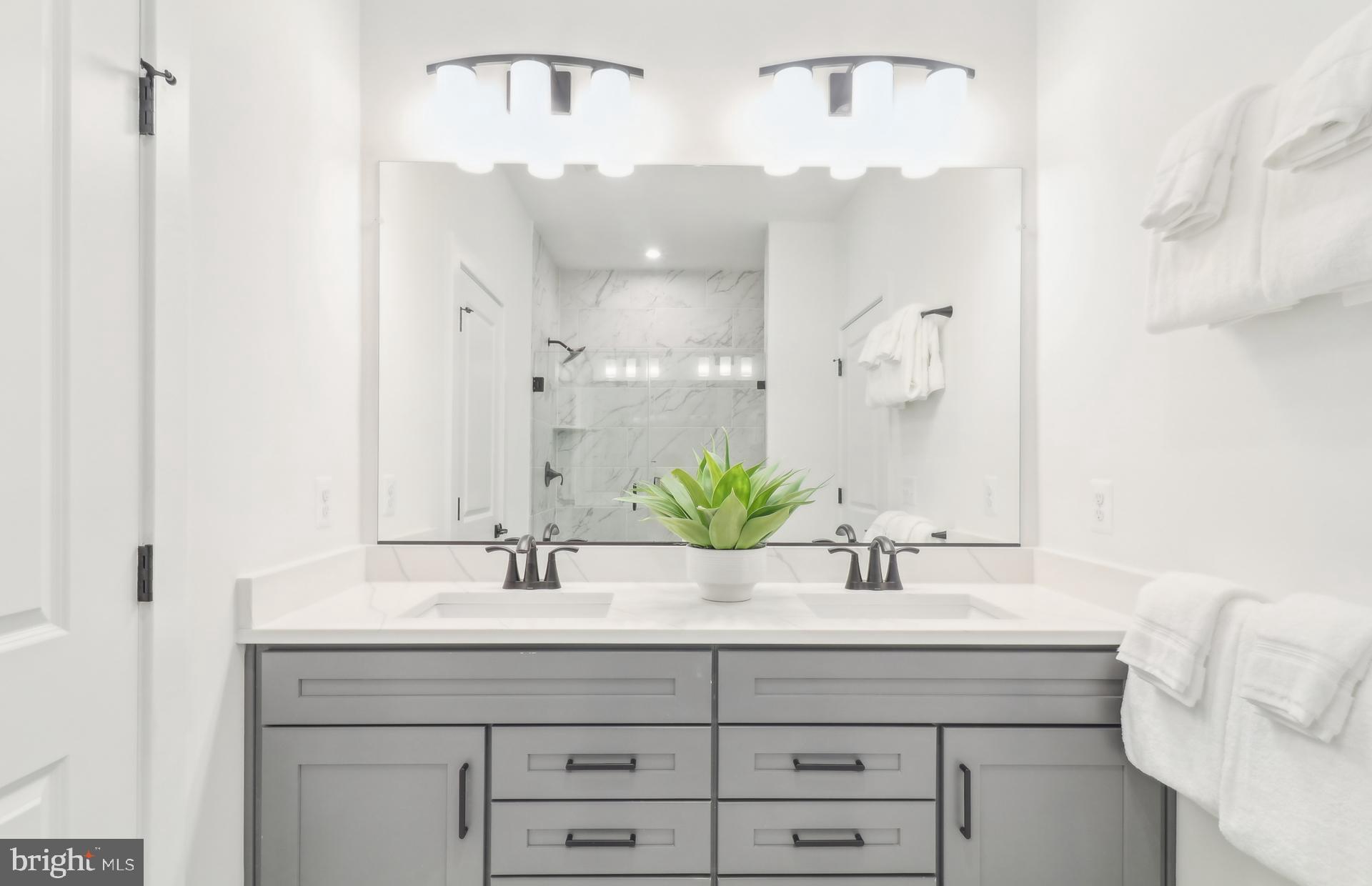 16146 Frederick Road Rockville, MD 20850 - Photo 15 of 41 a bathroom with a sink and a mirror
