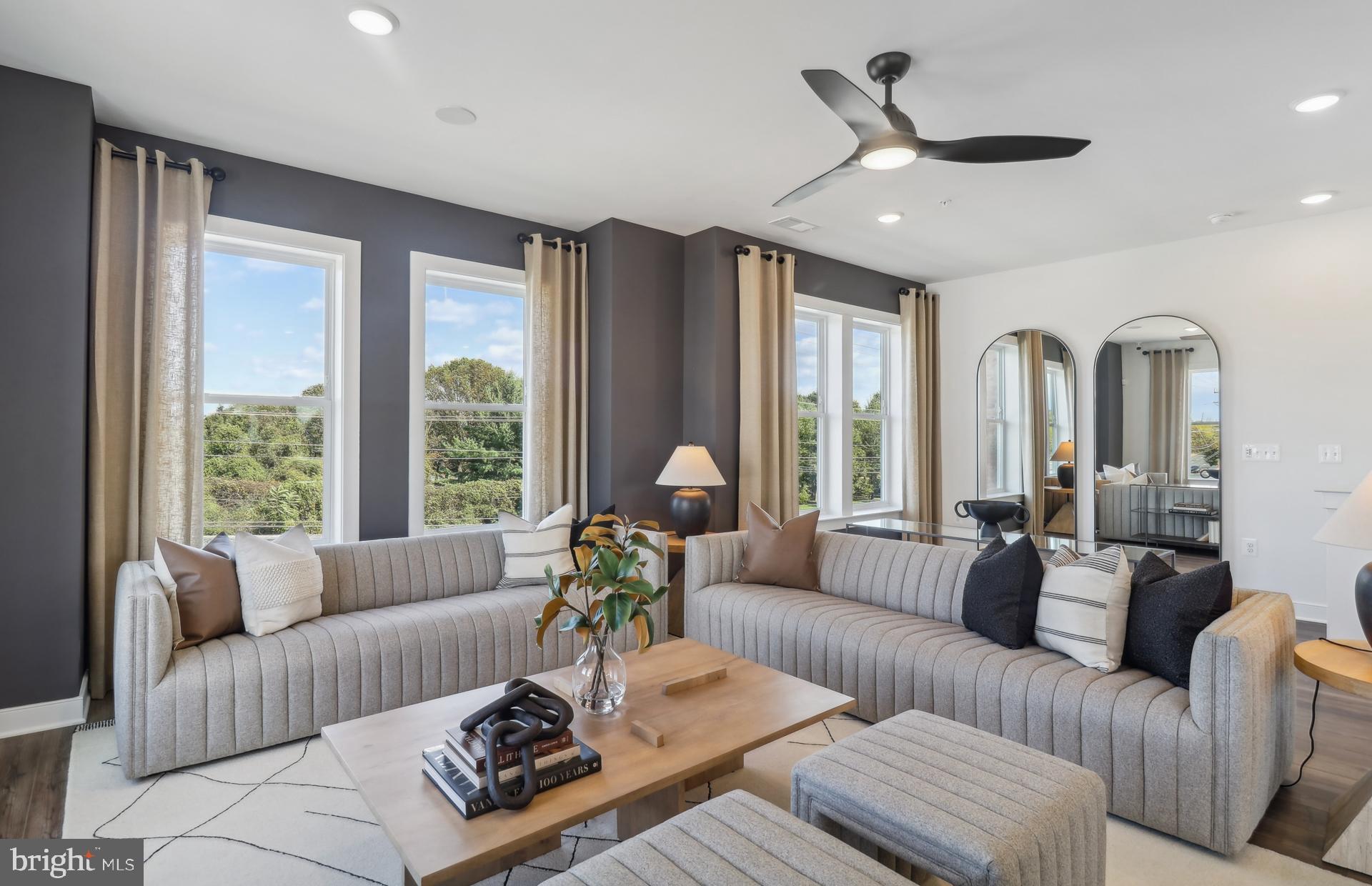 16146 Frederick Road Rockville, MD 20850 - Photo 3 of 41 a living room with furniture and a large window