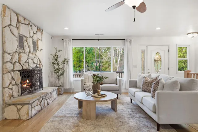 a bathroom with a tub and a view of bathroom