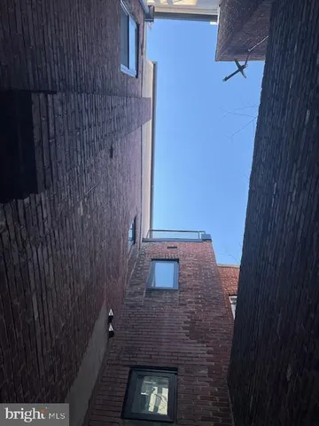 a large kitchen with stainless steel appliances granite countertop a large counter top and stove