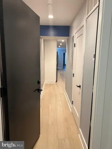 a living room with granite countertop furniture and natural light