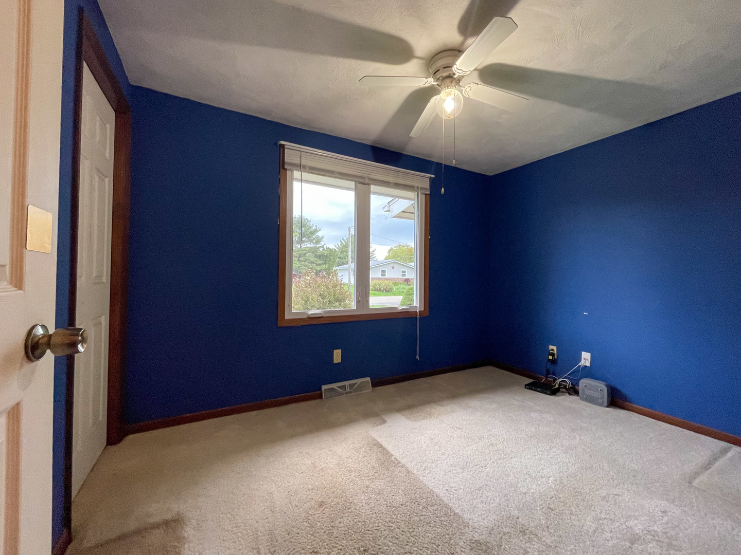 8010 Kasson Road Harvard, IL 60033 - Photo 13 of 40 an empty room with windows and fan