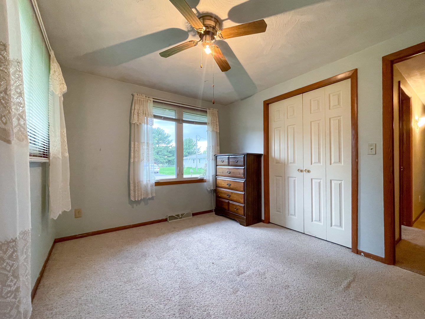 8010 Kasson Road Harvard, IL 60033 - Photo 16 of 40 a view of an empty room with a window and a kitchen