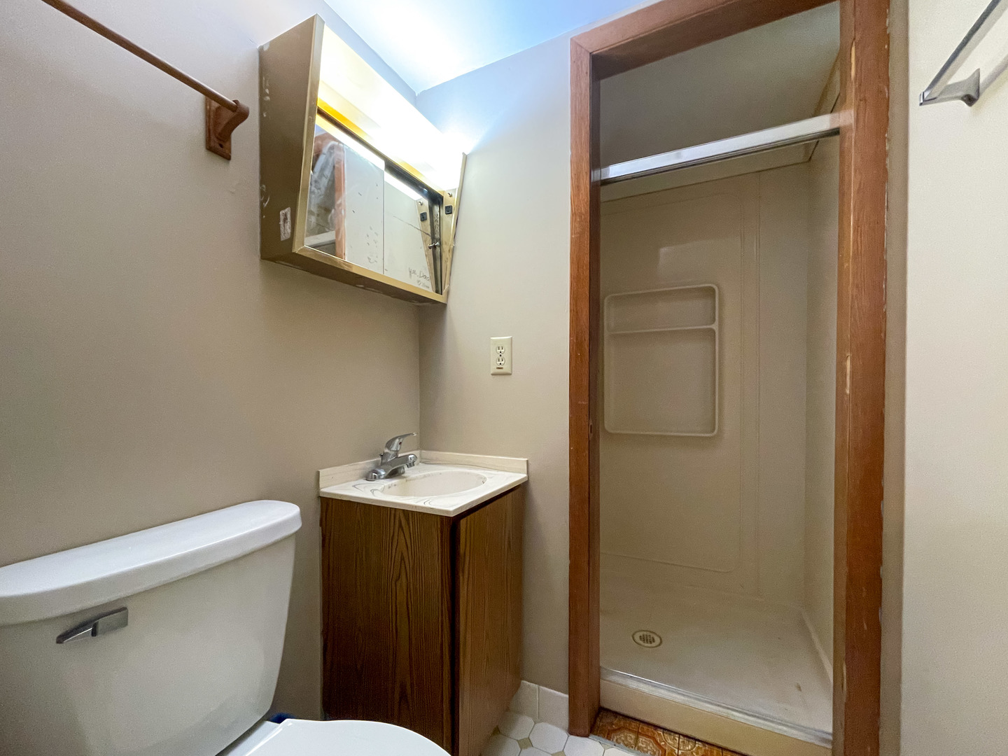 8010 Kasson Road Harvard, IL 60033 - Photo 20 of 40 a bathroom with a sink a toilet and shower