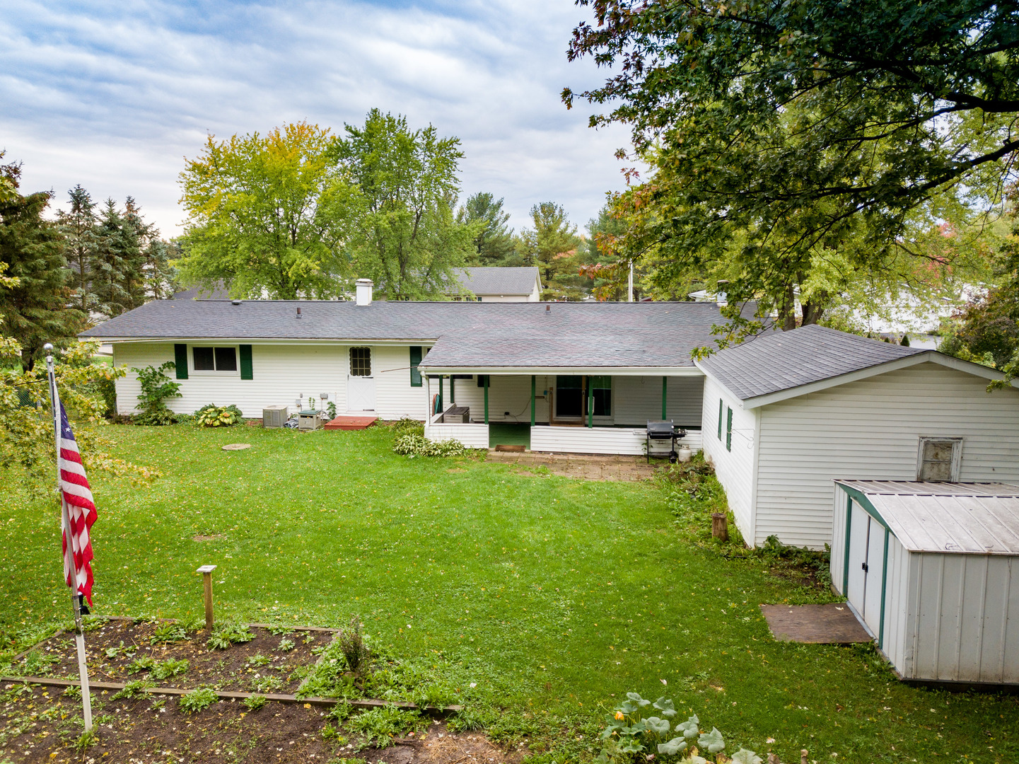 8010 Kasson Road Harvard, IL 60033 - Photo 28 of 40 a front view of a house with garden