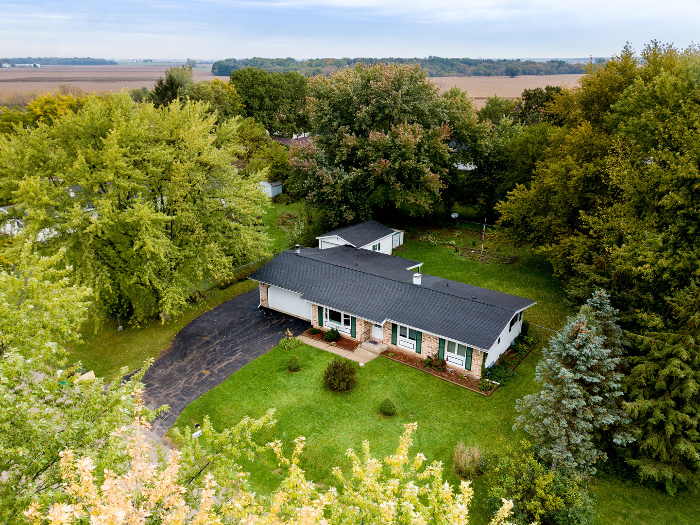 8010 Kasson Road Harvard, IL 60033 - Photo 33 of 40 a view of a house with a yard