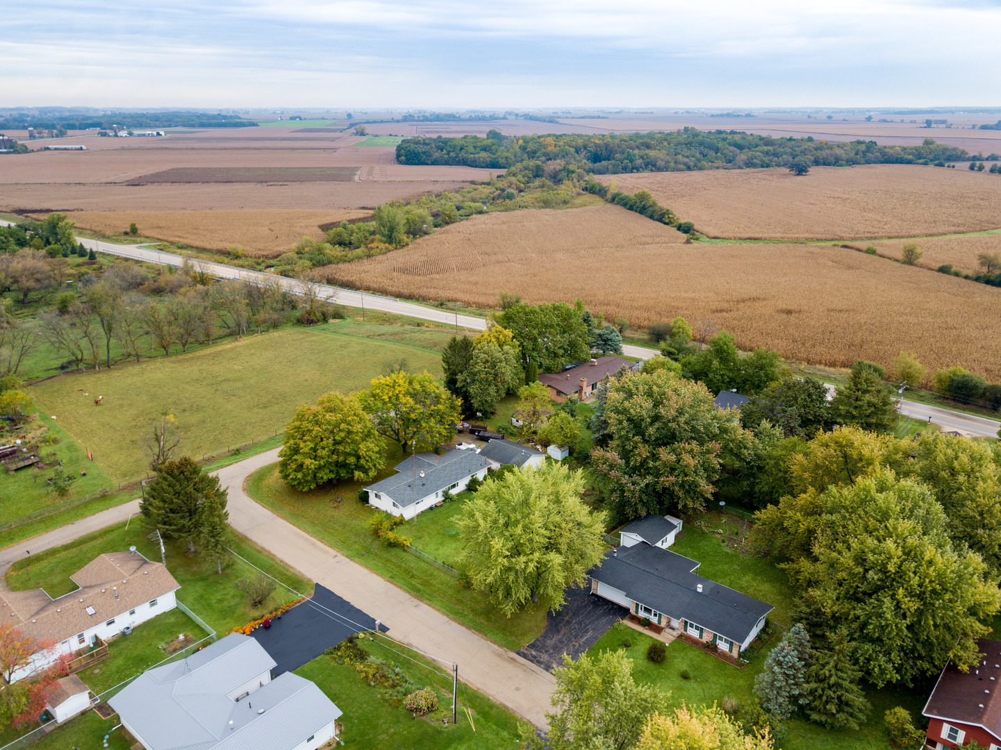 8010 Kasson Road Harvard, IL 60033 - Photo 34 of 40 an aerial view of ocean and residential houses with outdoor space