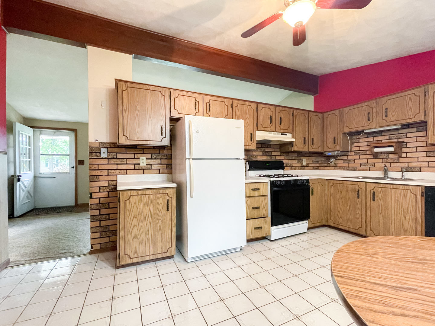 8010 Kasson Road Harvard, IL 60033 - Photo 9 of 40 a kitchen with stainless steel appliances granite countertop a refrigerator sink and cabinets