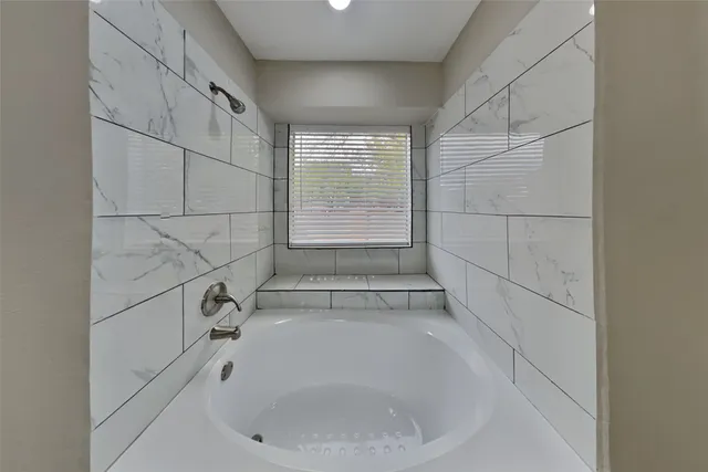 a bathroom with a tub