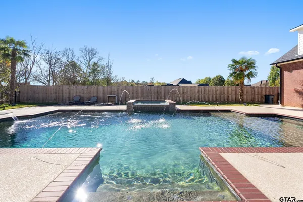swimming pool with a yard