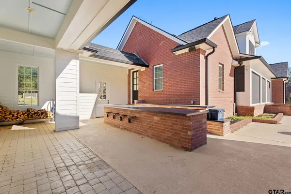 a view of a house with patio
