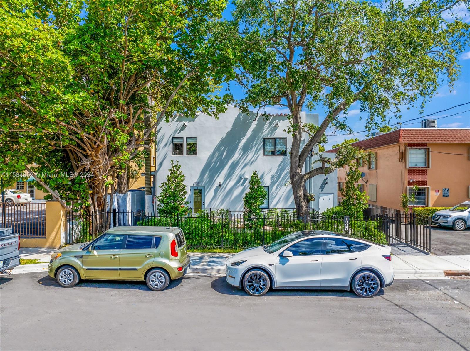1335 Southwest 4th Street Miami, FL 33135 - Photo 50 of 59 a car parked in front of a house