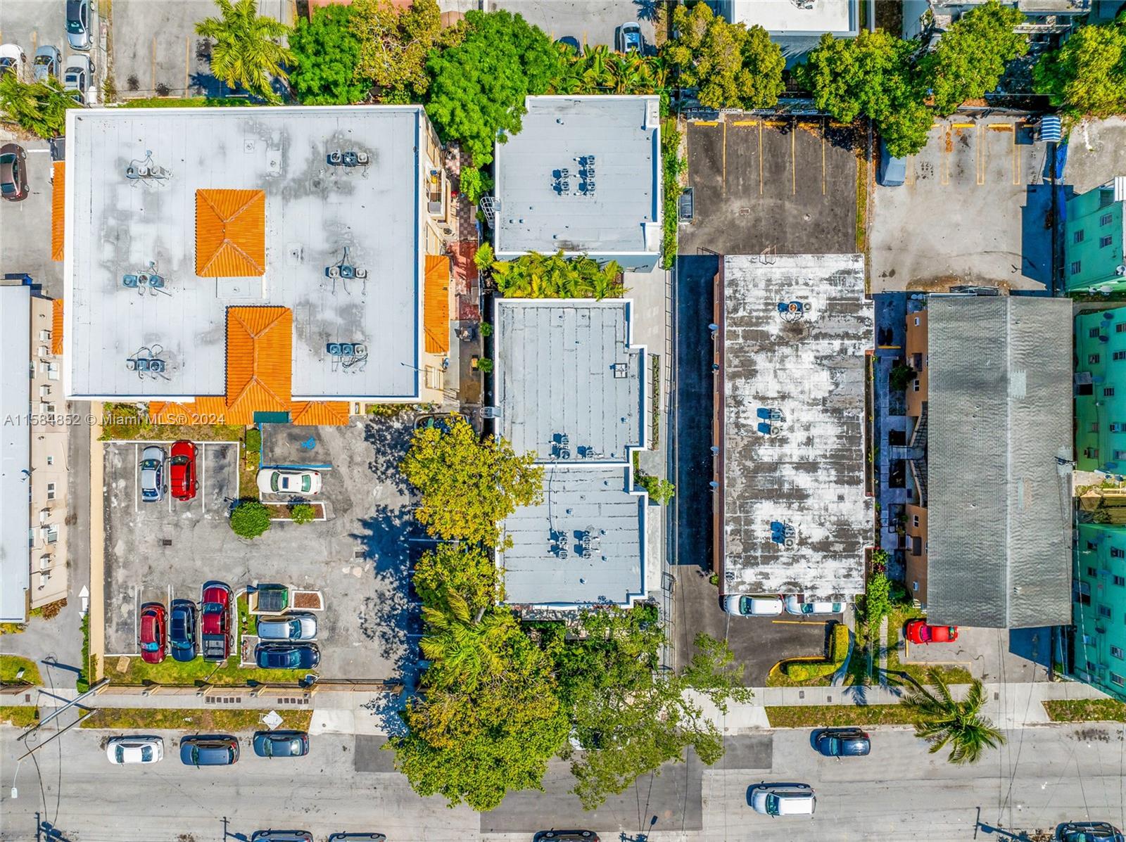 1335 Southwest 4th Street Miami, FL 33135 - Photo 51 of 59 aerial view of multi story residential apartment building with yard