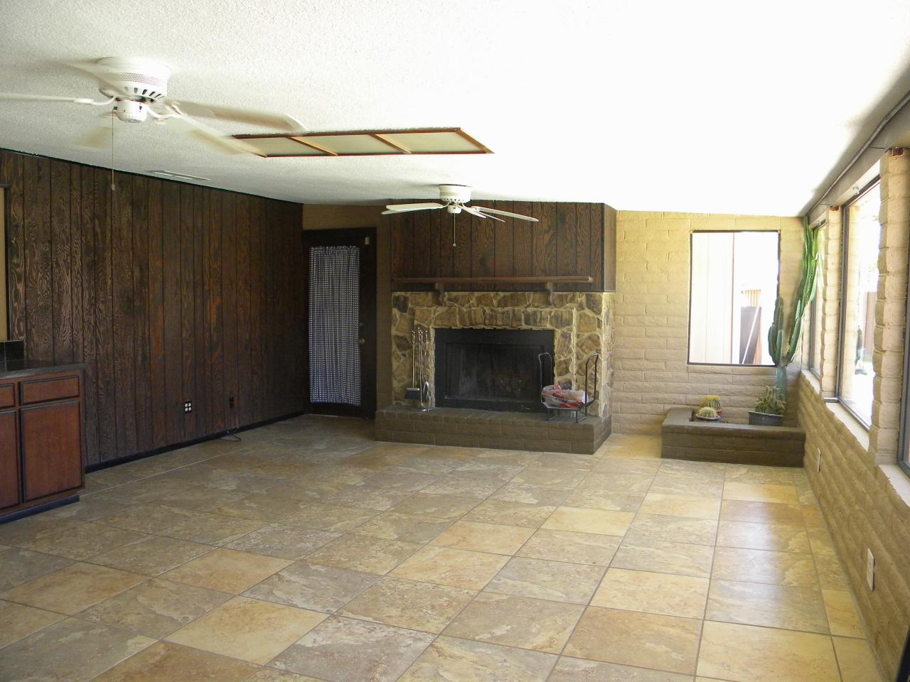 2964 East Bloomfield Road Phoenix, AZ 85032 - Photo 3 of 10 a view of an empty room with a fireplace