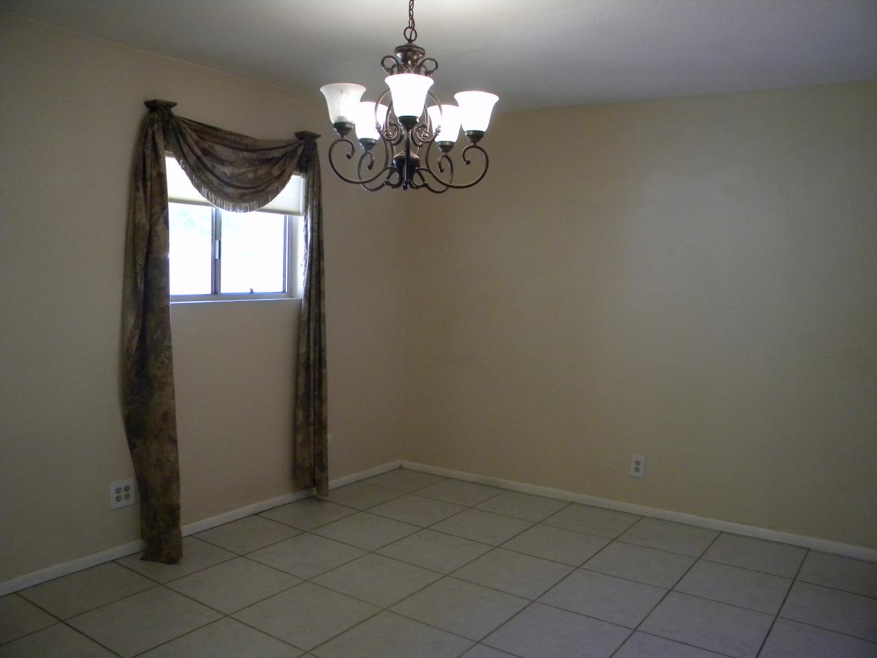 2964 East Bloomfield Road Phoenix, AZ 85032 - Photo 5 of 10 a view of a house with a chandelier
