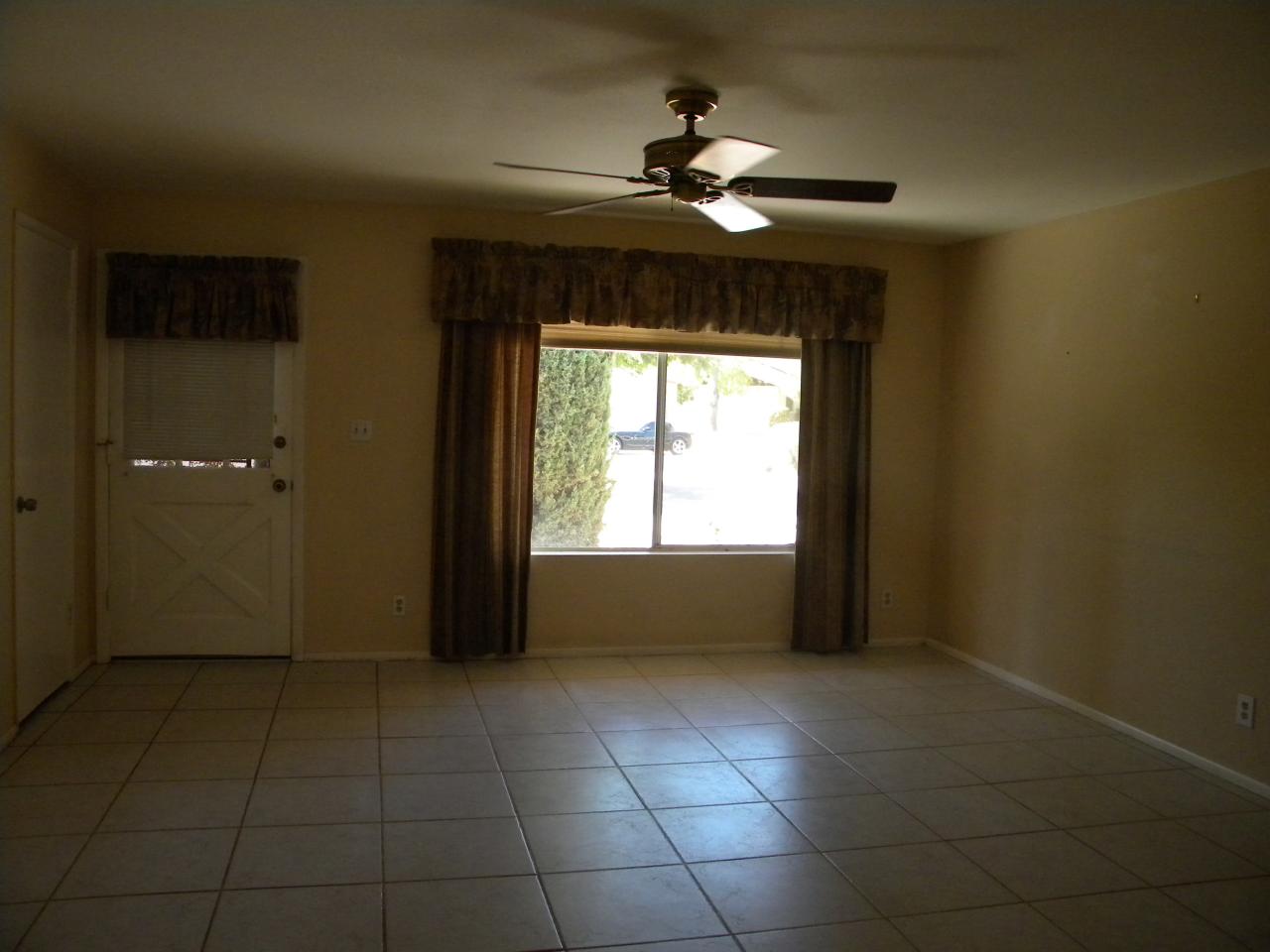 2964 East Bloomfield Road Phoenix, AZ 85032 - Photo 6 of 10 a view of an empty room with a window