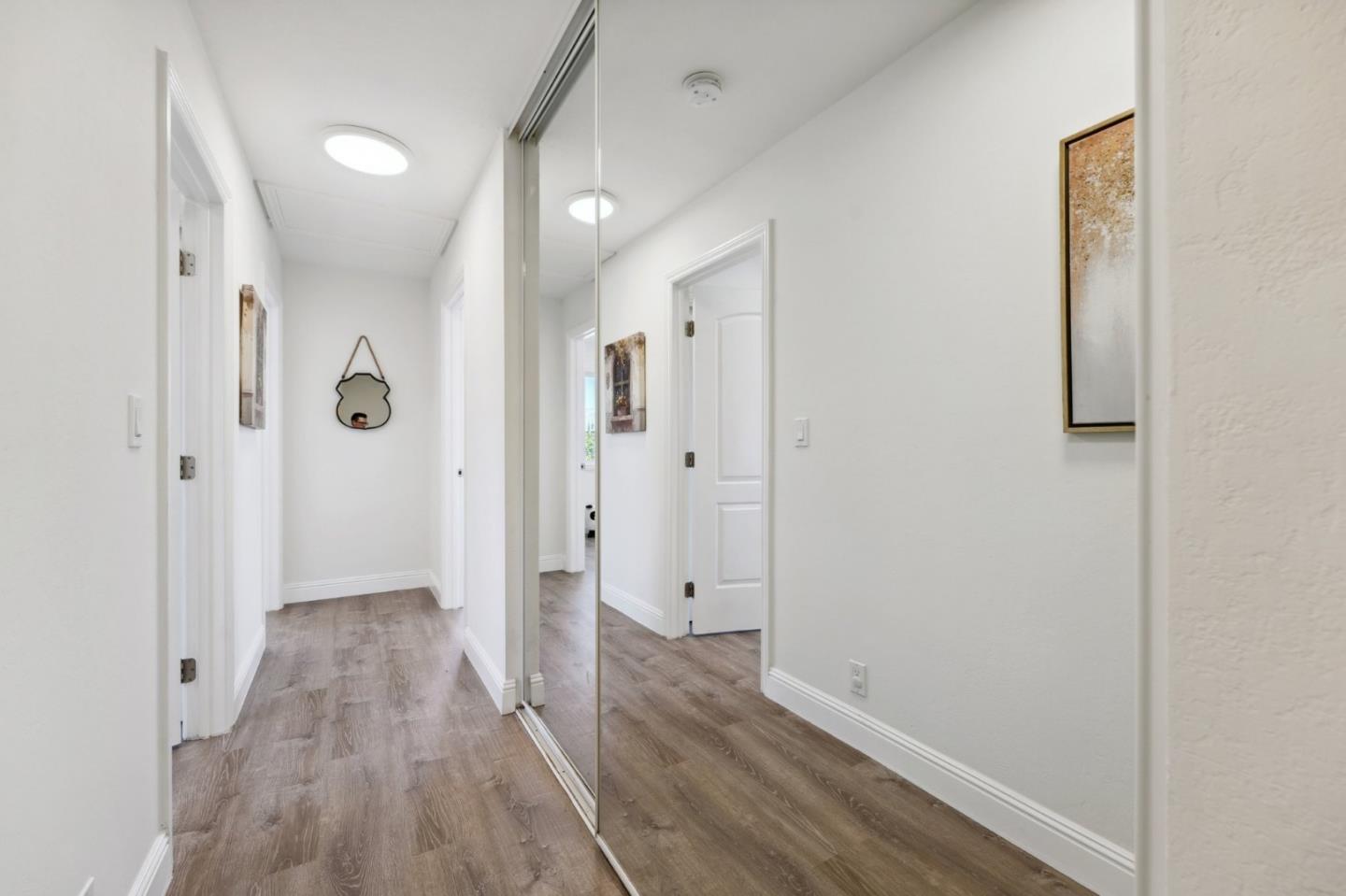 4615 Armour Drive Santa Clara, CA 95054 - Photo 12 of 35 a view of a hallway with wooden floor