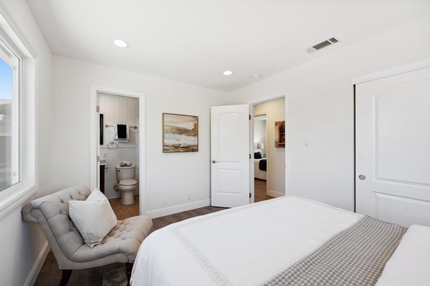 4615 Armour Drive Santa Clara, CA 95054 - Photo 13 of 35 a bedroom with a bed and glass windows