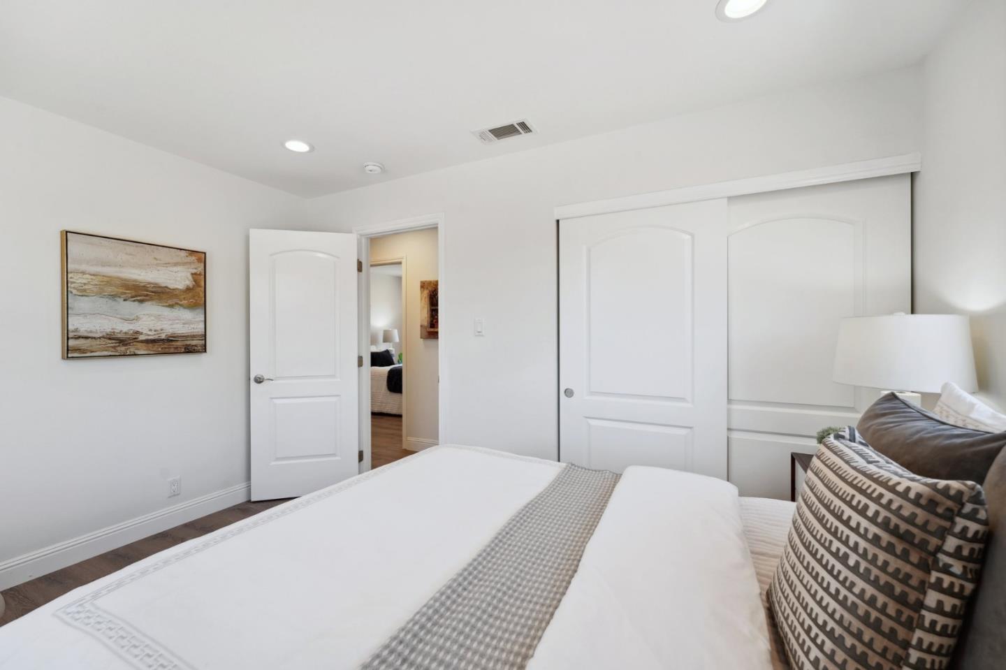 4615 Armour Drive Santa Clara, CA 95054 - Photo 15 of 35 a bedroom with a bed and a painting on the wall