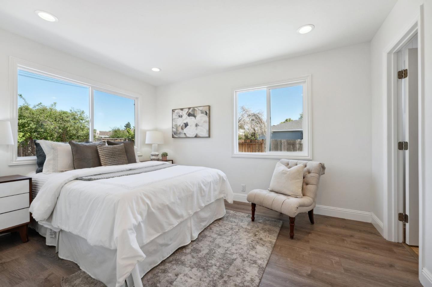 4615 Armour Drive Santa Clara, CA 95054 - Photo 16 of 35 a bedroom with a bed and a couch