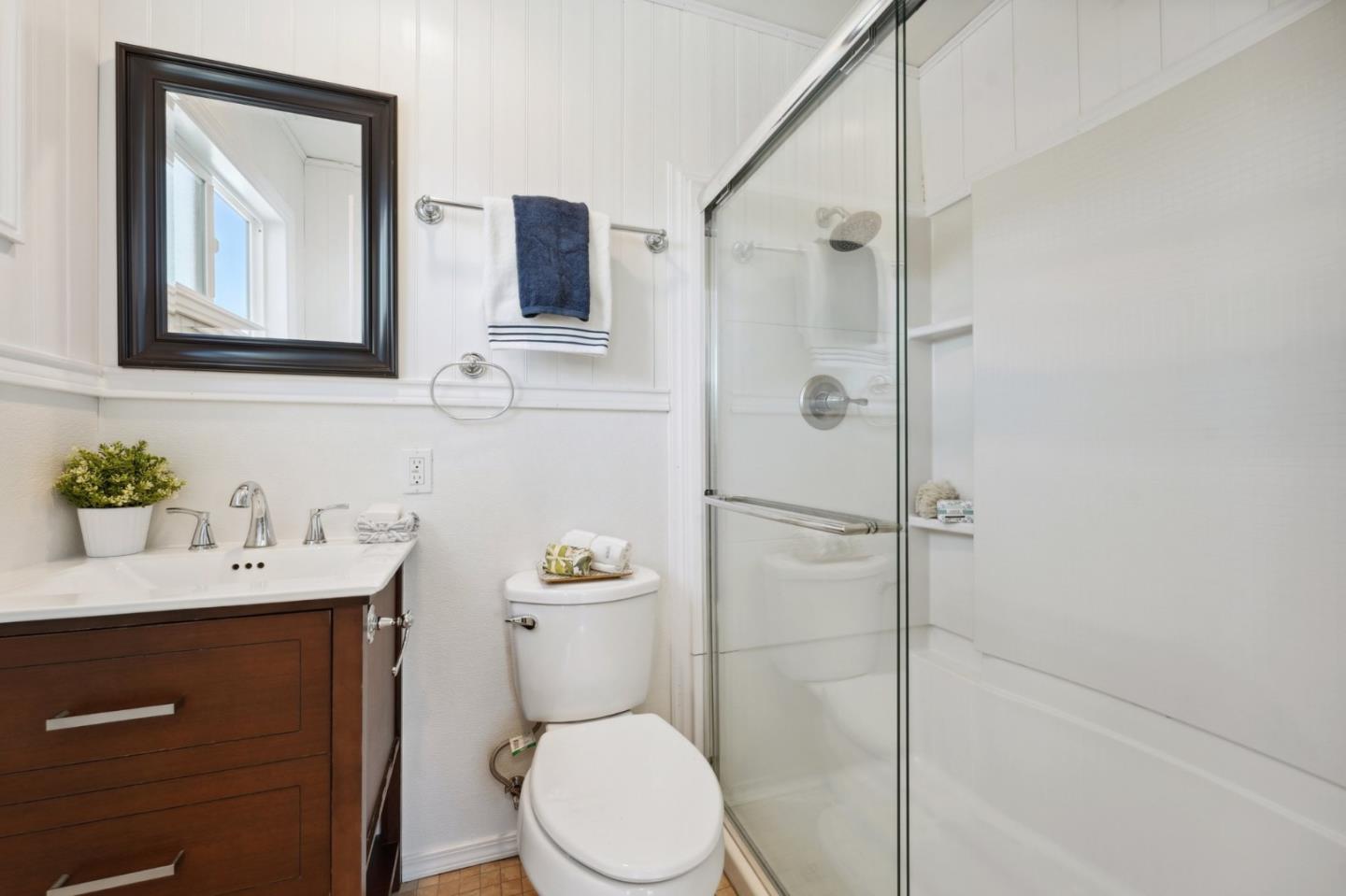 4615 Armour Drive Santa Clara, CA 95054 - Photo 17 of 35 a white toilet sitting next to a bathroom sink