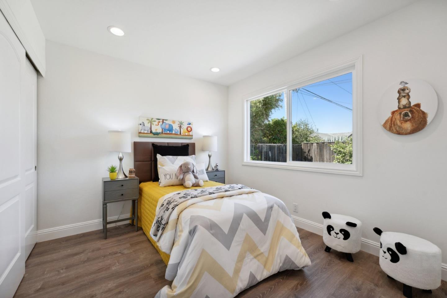 4615 Armour Drive Santa Clara, CA 95054 - Photo 21 of 35 a bedroom with a bed and wooden floor