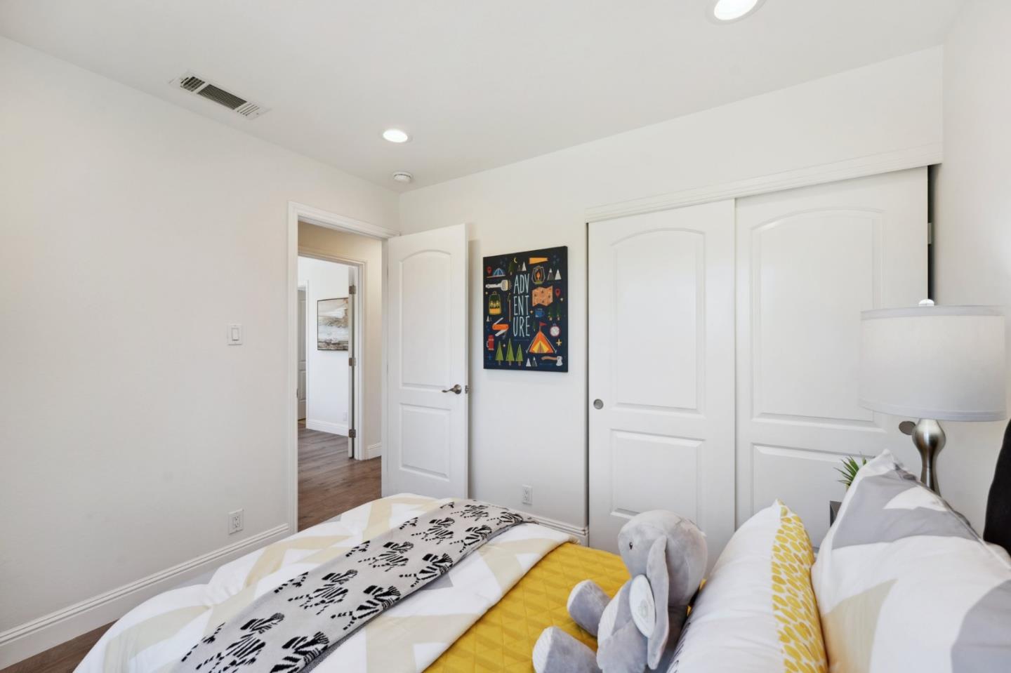 4615 Armour Drive Santa Clara, CA 95054 - Photo 22 of 35 a bedroom with a bed and a couch